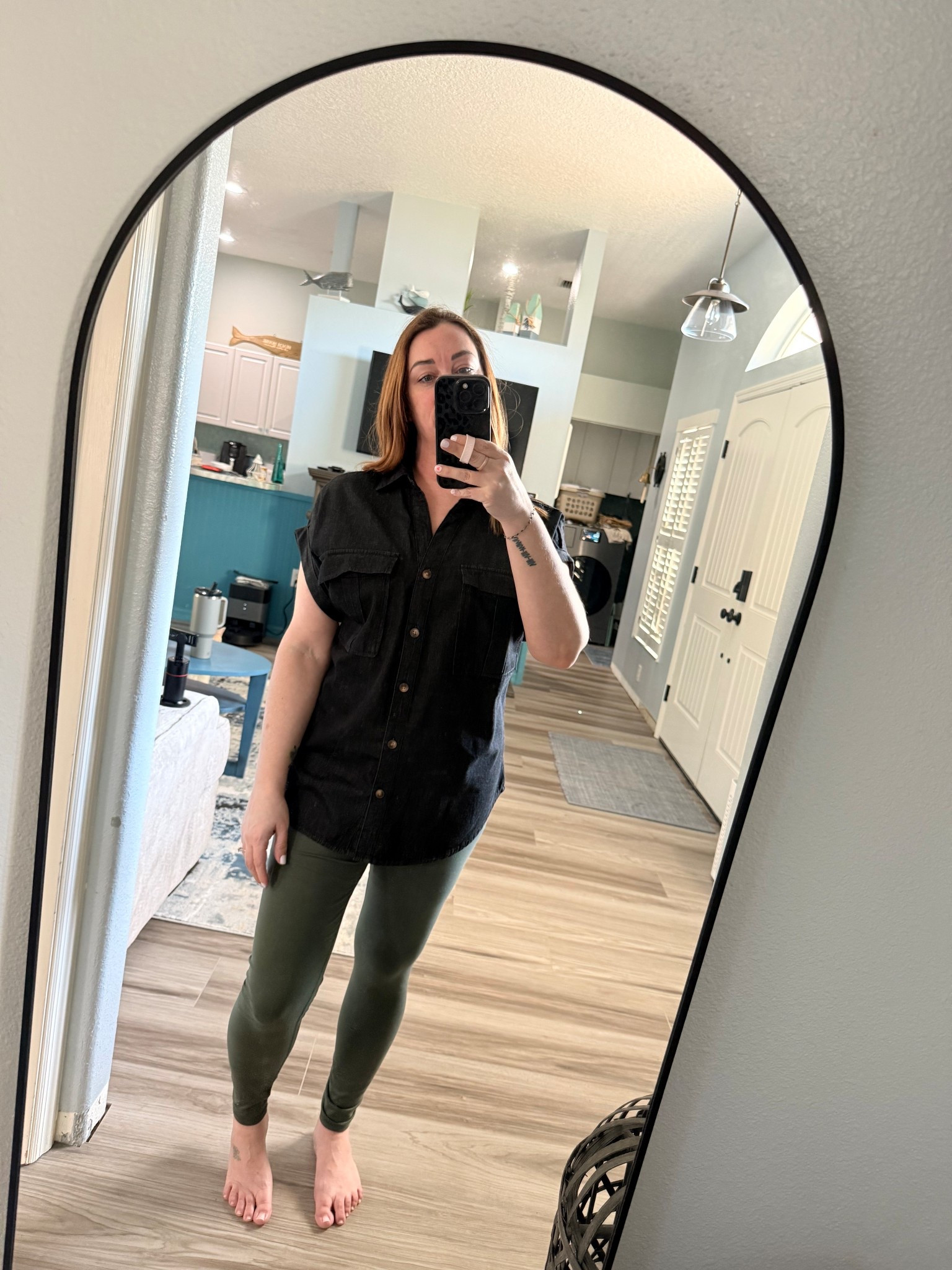 If you love elevated basics, this black button-down top is a must. 🖤

This relaxed fit collared shirt has that perfect in-between structure — polished enough to dress up, but soft enough to wear casually. The oversized chest pockets and short cuffed sleeves give it a modern utility vibe, while the lightweight fabric keeps it breathable and comfortable all day.

It’s the kind of versatile black blouse you can style with leggings, denim, trousers, or even layered over a tank. Classic, flattering, and easy to throw on when you want to look put together without trying too hard.

An everyday wardrobe staple that works for moms, work-from-home days, casual dinners, and travel outfits.

#blackbuttondown #everydaybasics #wardrobestaples #casualchicstyle #capsulewardrobe

#LTKOver40 #LTKdayinmylife #LTKootd