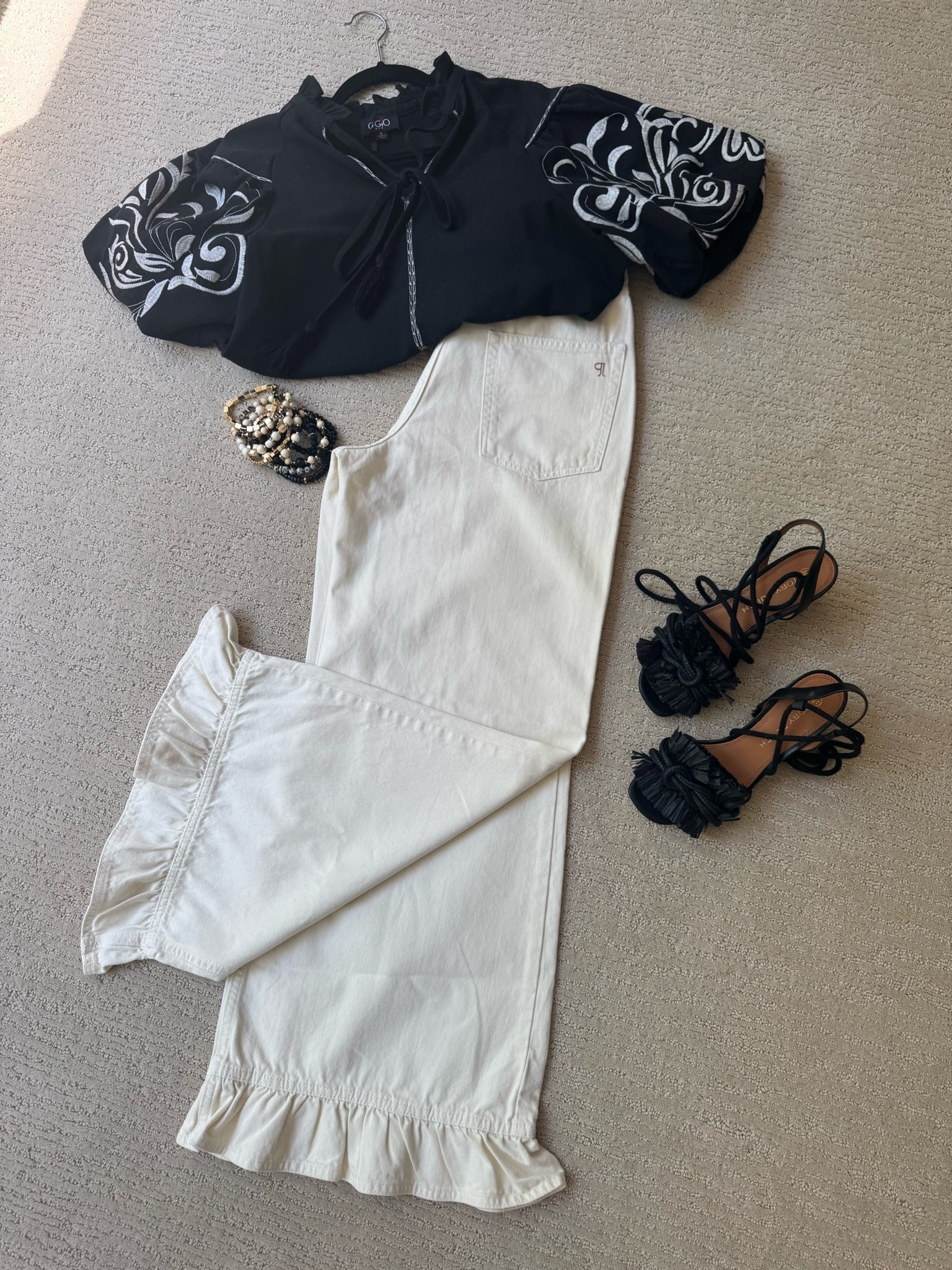 This cute ruffle bottom jean just sold out but we have linked a couple other pair that are still available! 
The stackable bracelets are still available in a large array of colors!  
Have linked similar fir the shoes and top.

#LTKOver40 #LTKSeasonal