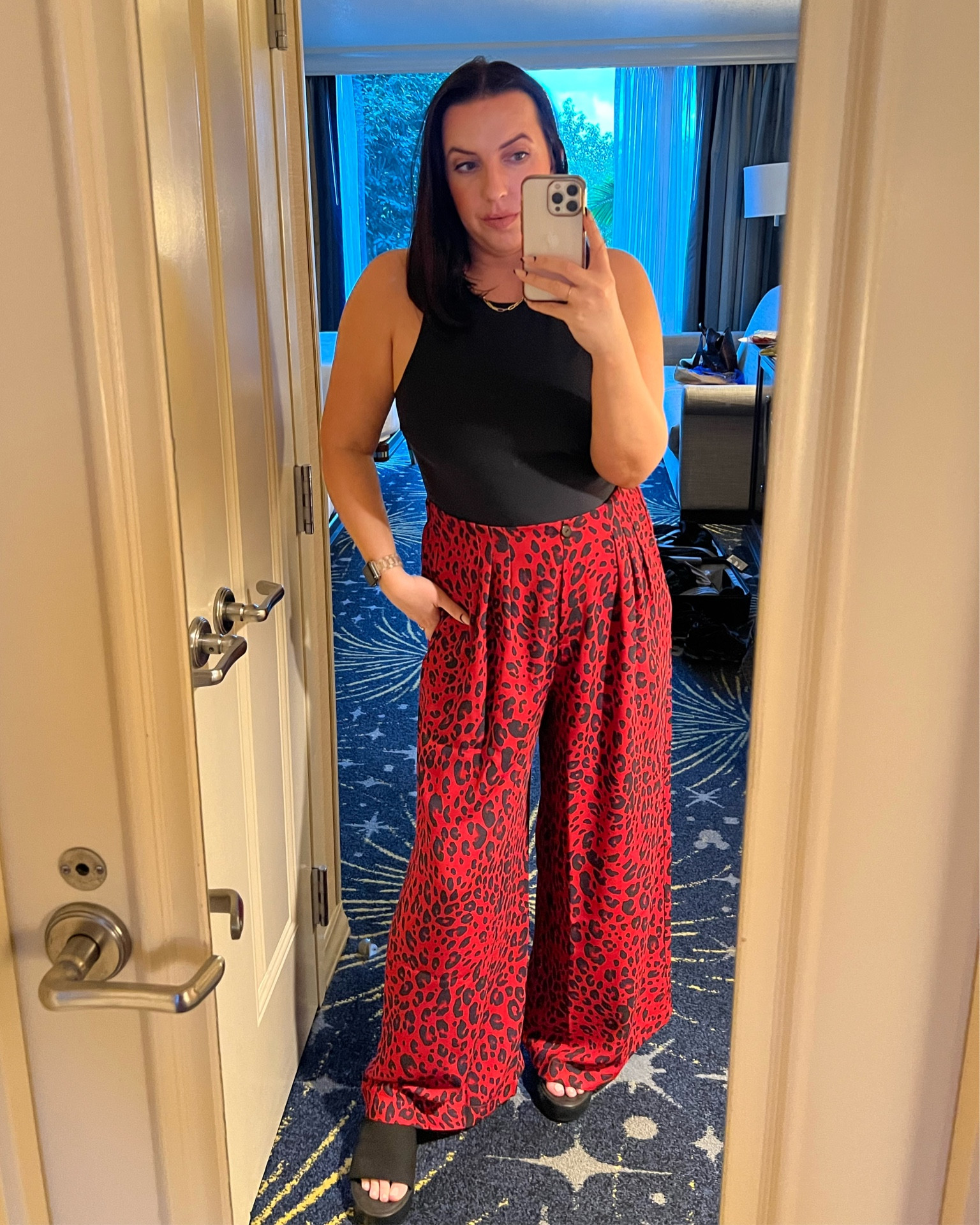 Vacation dinner outfit / red leopard trousers / black bodysuit 

#LTKtravel #LTKstyletip #LTKsalealert