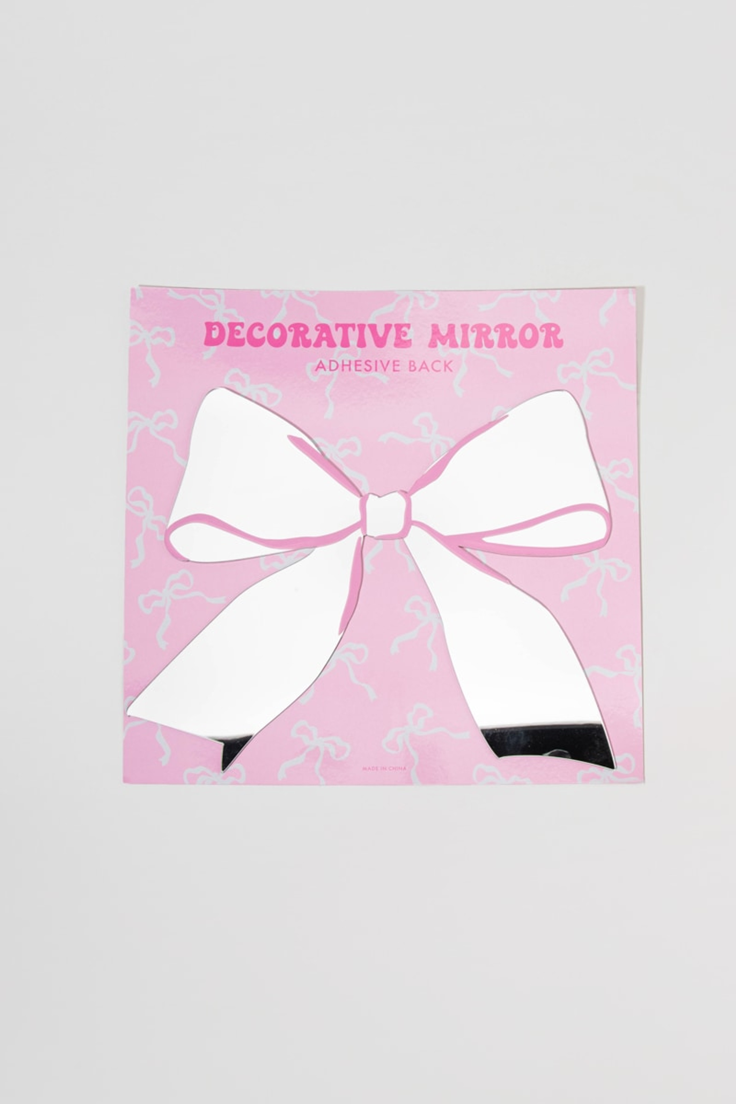 Stella Decorative Bow Shaped Mirror | Francesca's