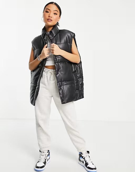 ASOS DESIGN Petite faux leather puffer vest in black | ASOS | ASOS (Global)
