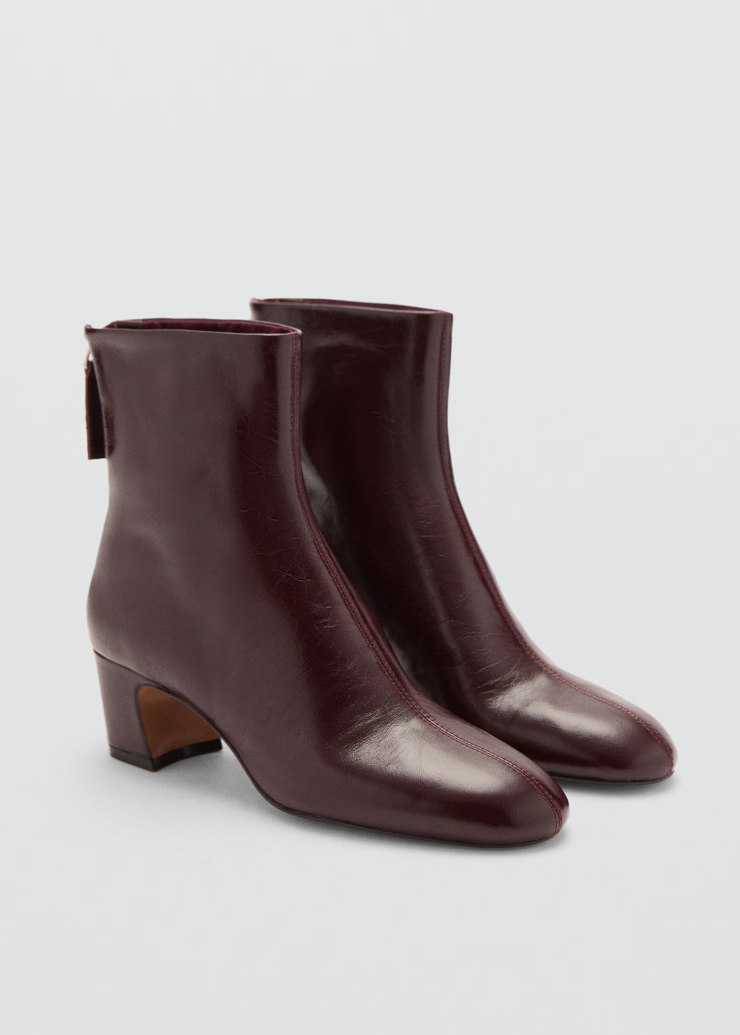 Zipped leather ankle boots - Women | MANGO United Kingdom | MANGO (UK)
