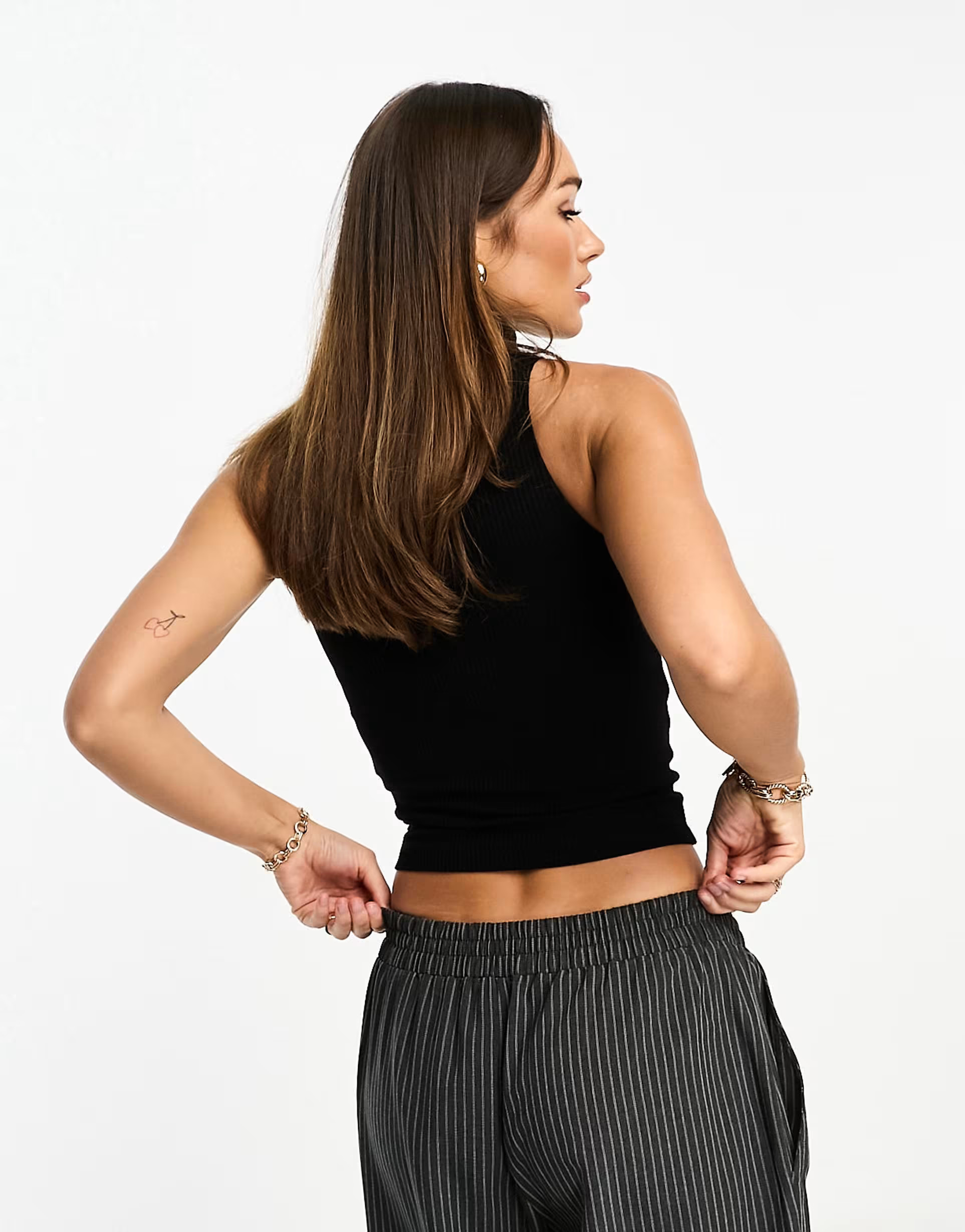 NA-KD roll neck sleeveless top in black | ASOS (Global)