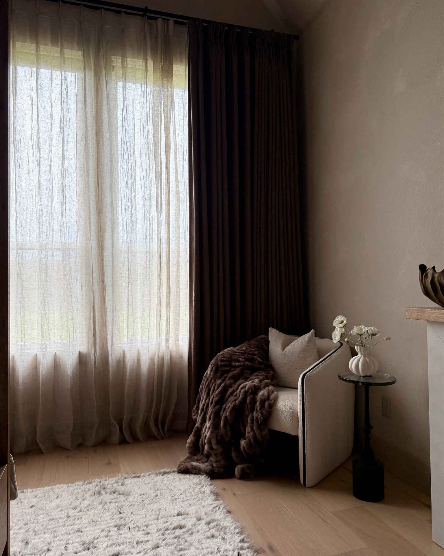 The coziest moody corner styled with a boucle barrel accent chair, side table, and layered curtains. 

Use code TMH22 for curtain discounts! 
Use code TMH20 for accent chair! 

#homedecor #accentchair #sidetable #curtains

#LTKHome #LTKSaleAlert