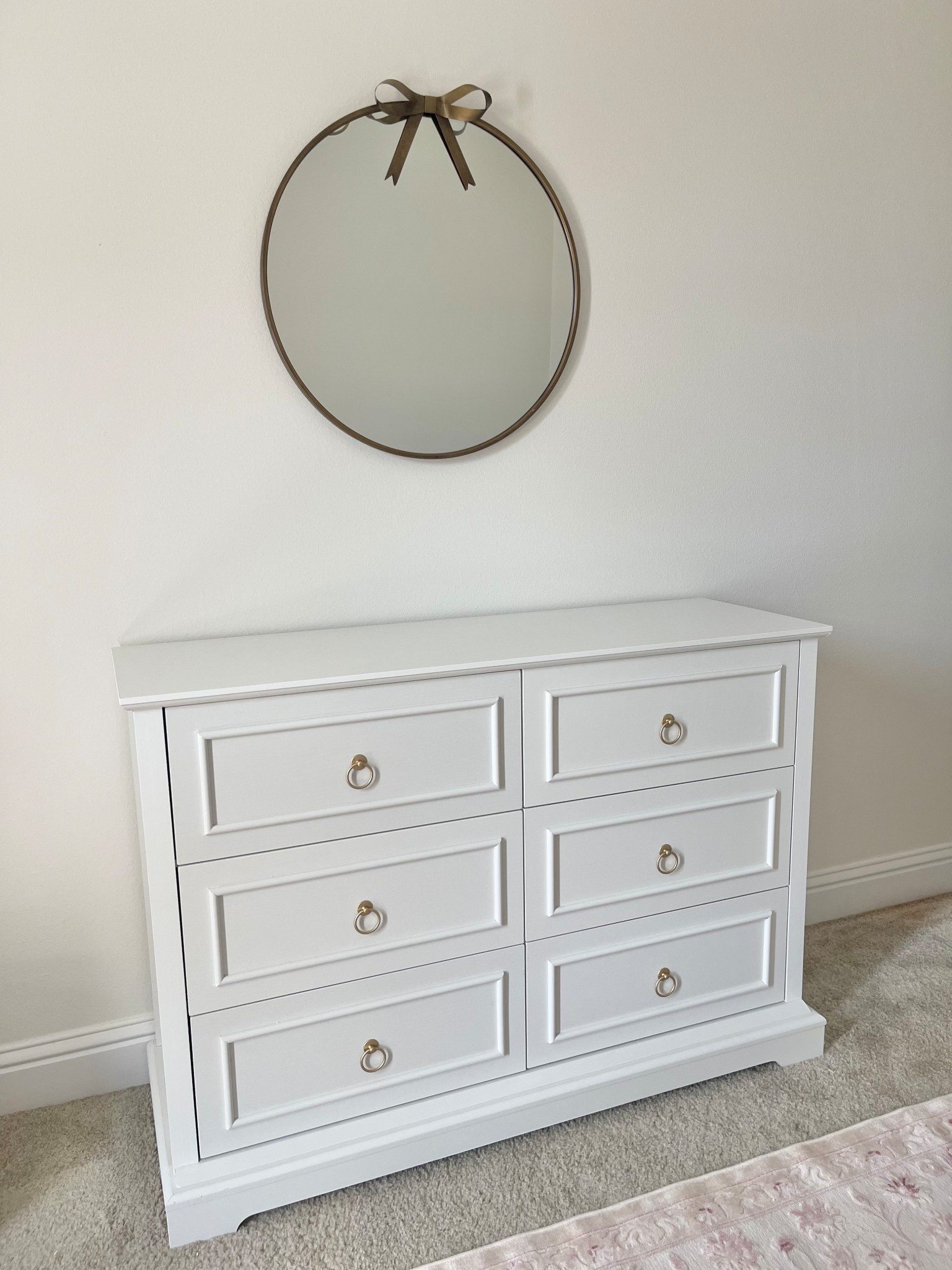 Toddler room , white dresser, gold bow wall mirror 

#LTKKids #LTKSaleAlert #LTKHoliday