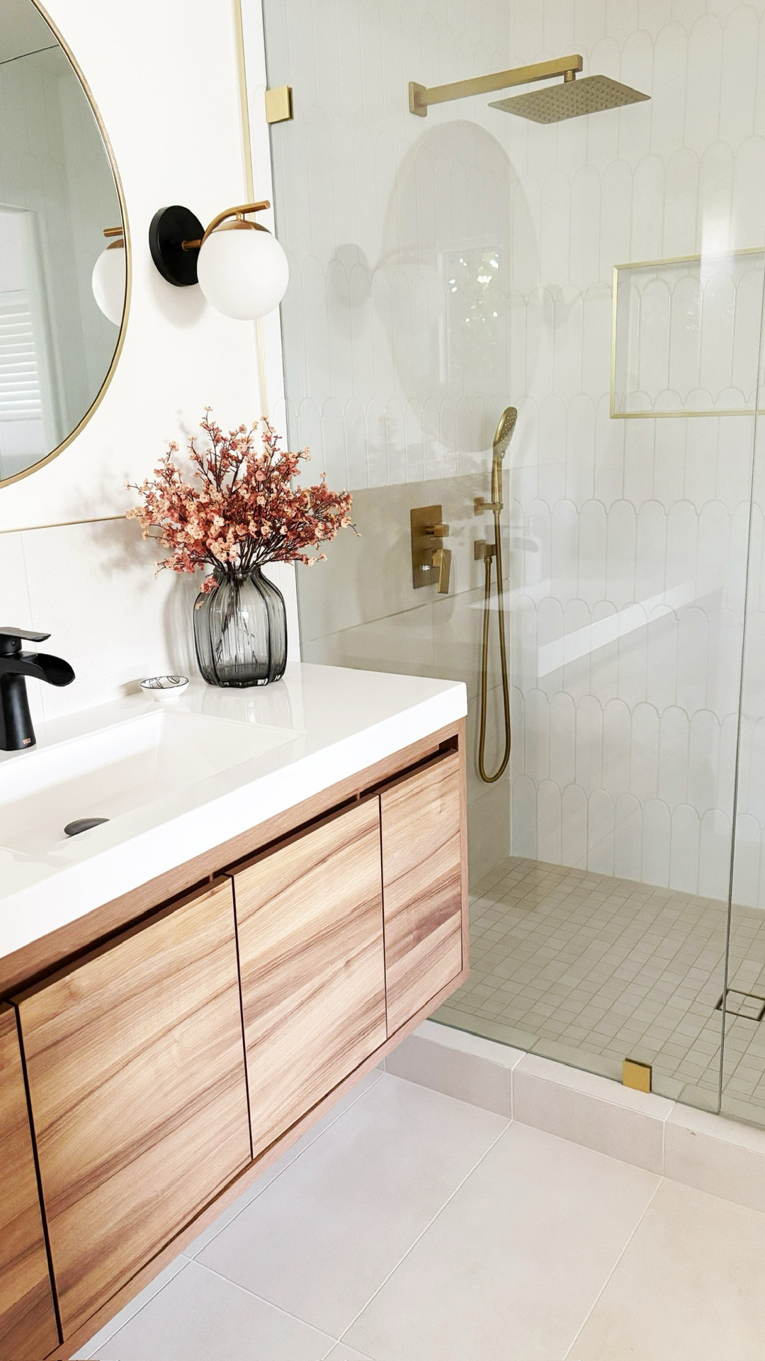 Julie’s quiet luxury bathroom renovation turned out so good!  She really maximized the small space and created a spa like vibe here.  

#LTKHome