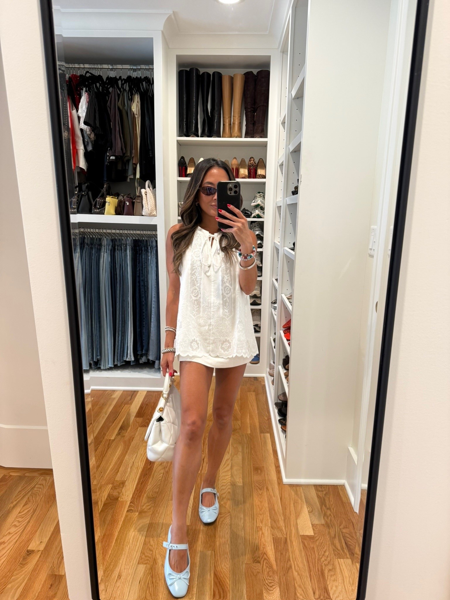 Embroidered tops are hereee for summer!!! And honestly IMO not going away! Love this one from @Lily Studio — I got size S. My skort is 00, flats are size 6.

#LTKootd #LTKPetite #LTKOver40