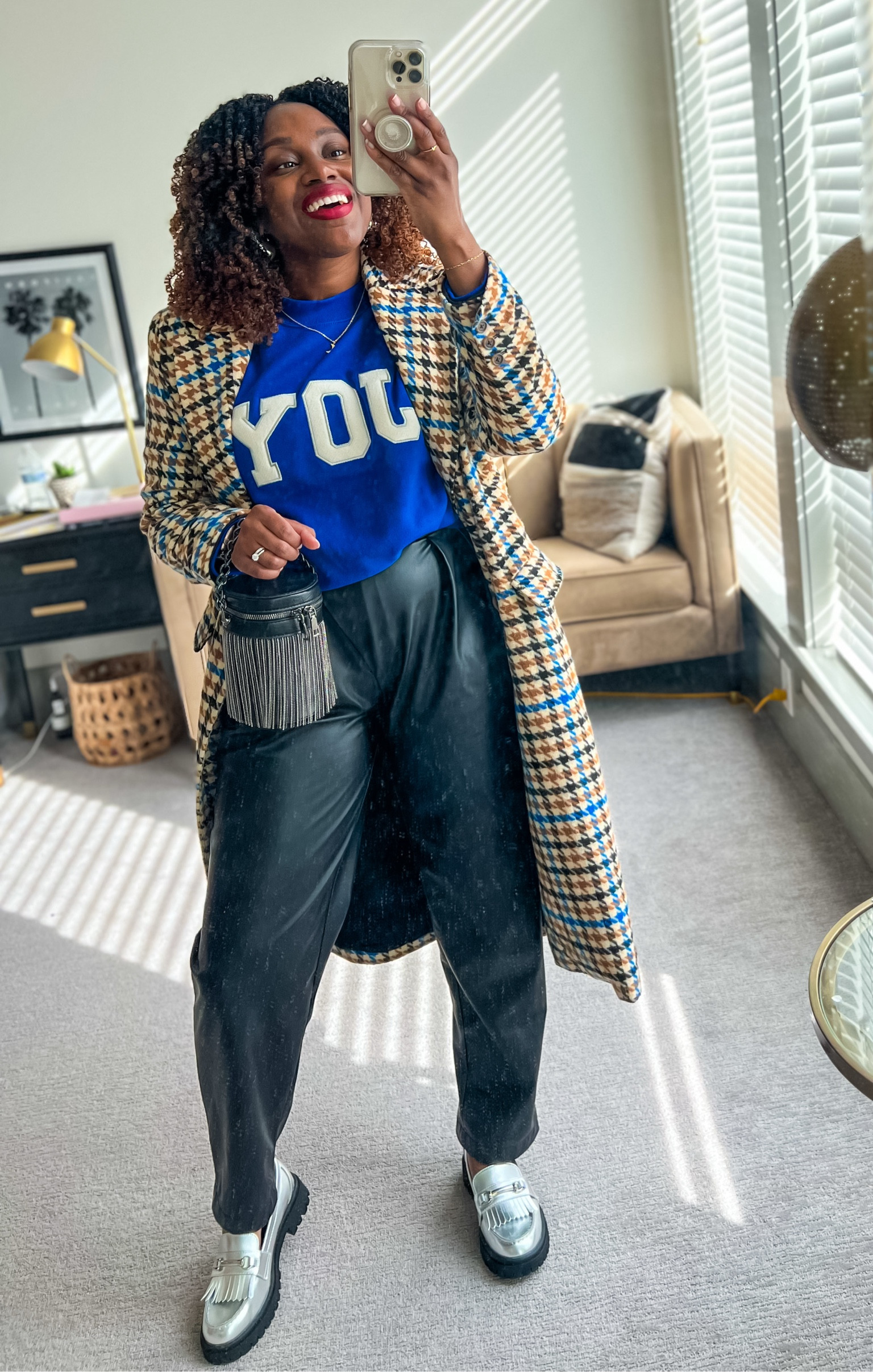 Found the cutest holiday sweatshirt at such a reasonable price. Super cute to style for a holiday outfit 💙🤎🖤

#LTKHoliday #LTKSeasonal #LTKFindsUnder50