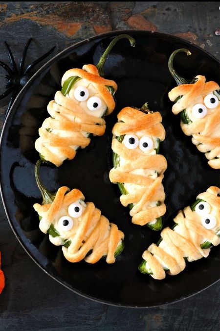 Mummy Jalapeno Poppers
These Mummy Jalapeno Poppers are cute, spooky, and loaded with yummy ingredients. This recipe is incredibly easy to make and certainly an impressive edition to the Halloween party table. You can make the heat level of your mummy poppers either super spicy or more flavorful with spices, the choices are yours.
Full Recipe Here: https://bit.ly/3EGy7Xp

#halloweenfood #halloween2023 #halloweenparty #halloweenvibes #jalapenopoppers 