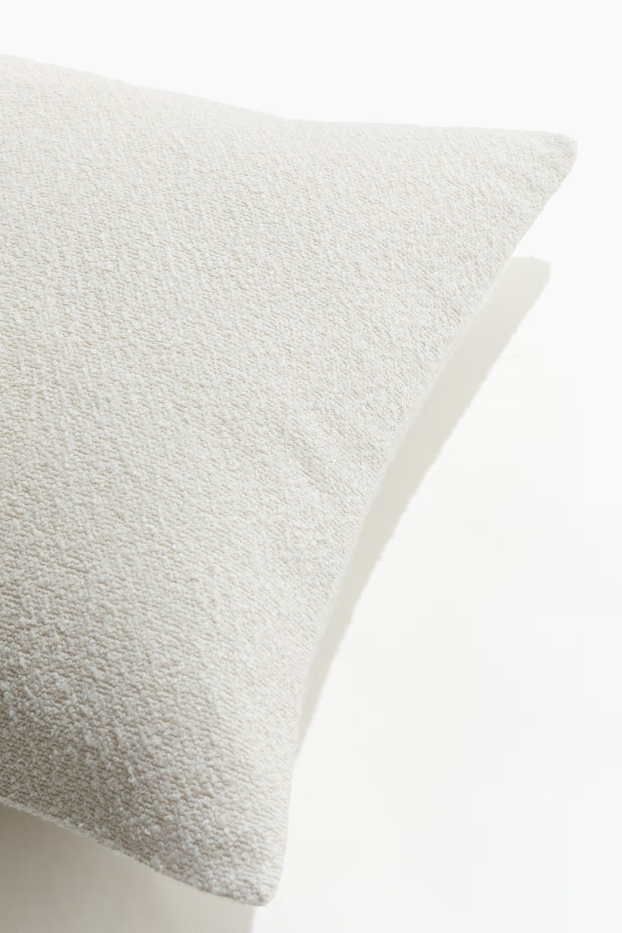 Housse de coussin en bouclette | H&M (FR, IT, ES, PT, BE)