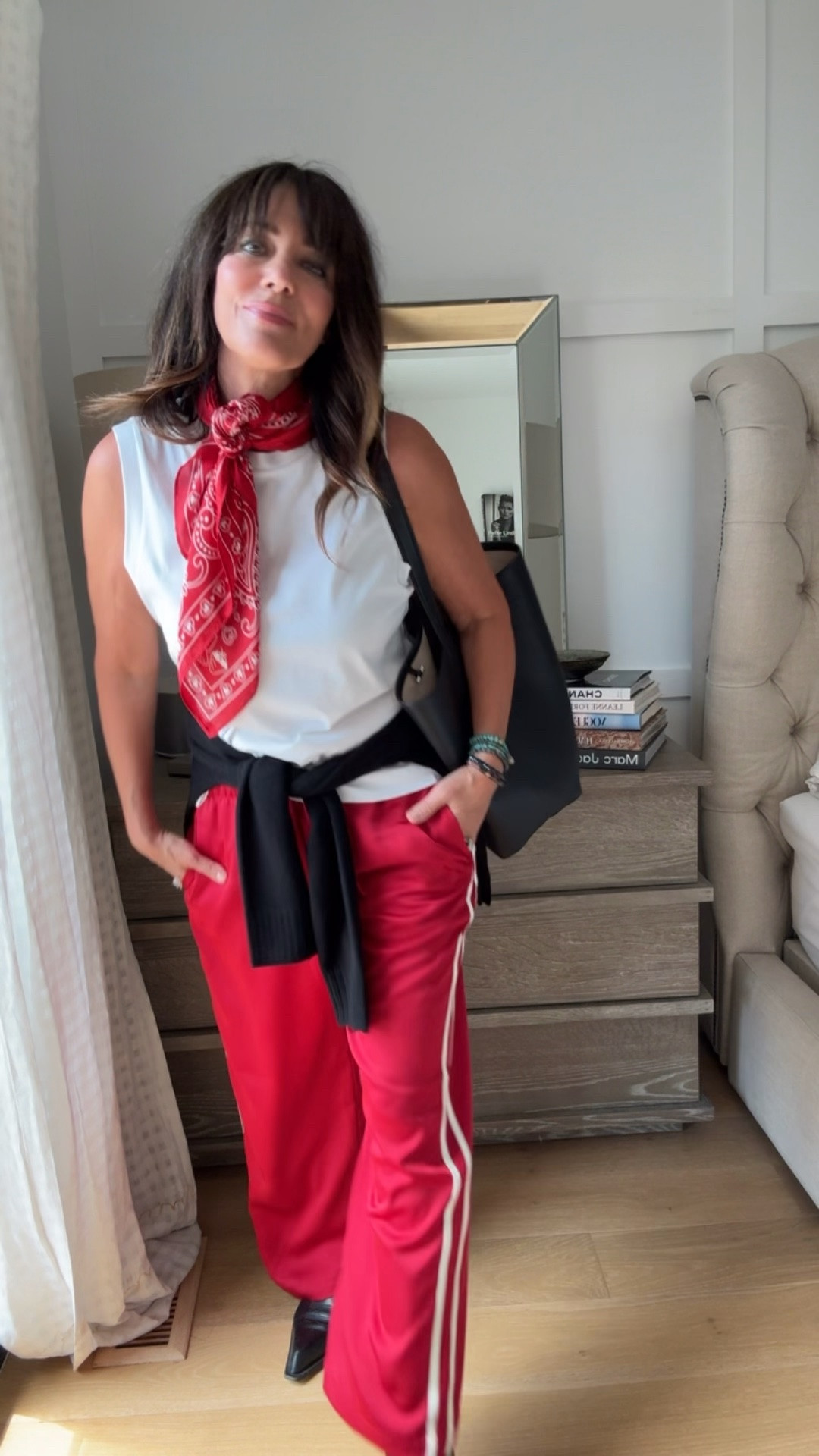 Loving red lately especially with white and black. Everything is a great deal here. Wearing size medium in the silk red pants

#LTKOver40 #LTKSaleAlert #LTKTravel