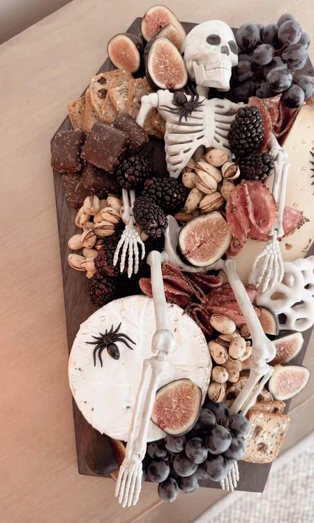 Spooky Halloween Charcuterie Board. Linking the coffin board, mini possible skeleton and plastic spiders, along with a few goodies I used. 

#LTKHalloween #LTKSeasonal #LTKparties