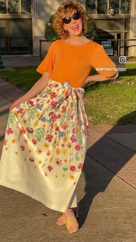 This sateen maxi skirt has me feeling like a princess👑! With a beautiful drape and a gorgeous floral 💐meadow print, it's a show-stopper, for sure! I paired it with a pleated sleeve crewneck tee in melon that emphasized the colors of sunset. 
🌅✨
My pleated sleeve tee comes in 4 colors and my raffia mules are a fabulous #targetfind !


Follow my shop @emptynestblessed on the @shop.LTK app to shop this post and get my exclusive app-only 

#LTKshoecrush #LTKSeasonal #LTKover40