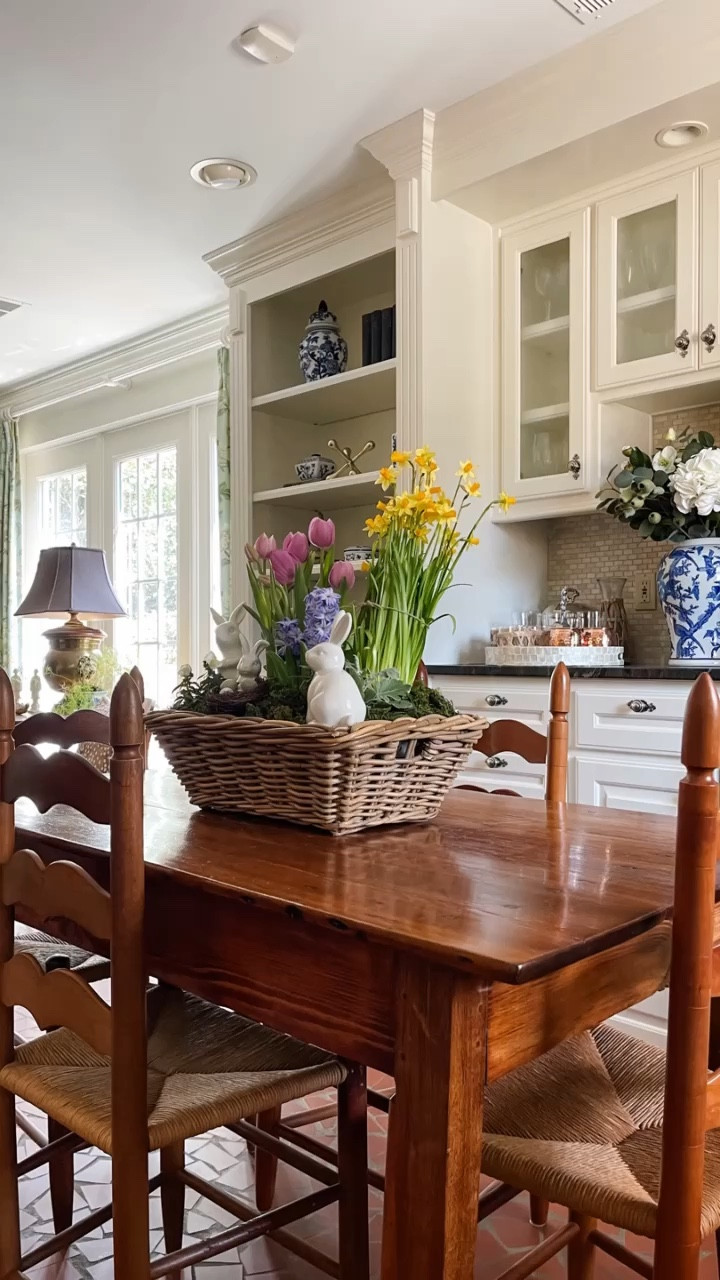 Spring is just around the corner, and I'm here to sprinkle a little inspiration your way with a living centerpiece that promises to bloom right through the season! 🌷🌼 Last year, I crafted this beauty using potted Tulips, Hyacinth, Daffodils, Snapdragon, and Dusty Miller - all chosen before their bloom to ensure they last even longer. To create your own, start with laying plastic bags at the bottom of a large basket (or any vessel you love), arrange the potted flowers with saucers underneath for protection, and nestle in some moss for that lush look. Don’t forget to add a personal touch with Easter or Spring decor - I went with ceramic bunnies and a cozy nest of faux eggs. 🐰🥚 It’s not just a centerpiece; it’s a statement that brings life to any Easter or Spring table setting. And guess what? These flowers will keep smiling at you way beyond a week! 
🪺🐇💕

#LTKSeasonal #LTKhome #LTKVideo