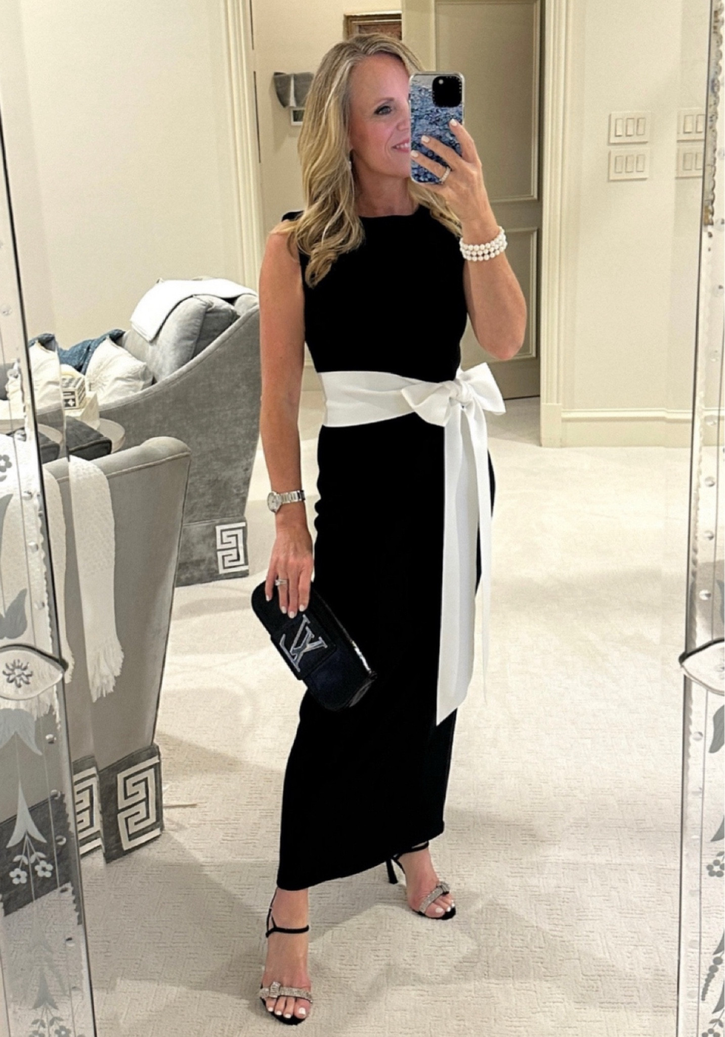 Christmas party / Holiday outfit inspiration!
Black and white midi sheath dress with white bow shash 
Fits slim so I sized up one 
I’m 5’2” tall for length reference 
Schutz black suede and crystal sandals 

#LTKParties #LTKStyleTip #LTKHoliday