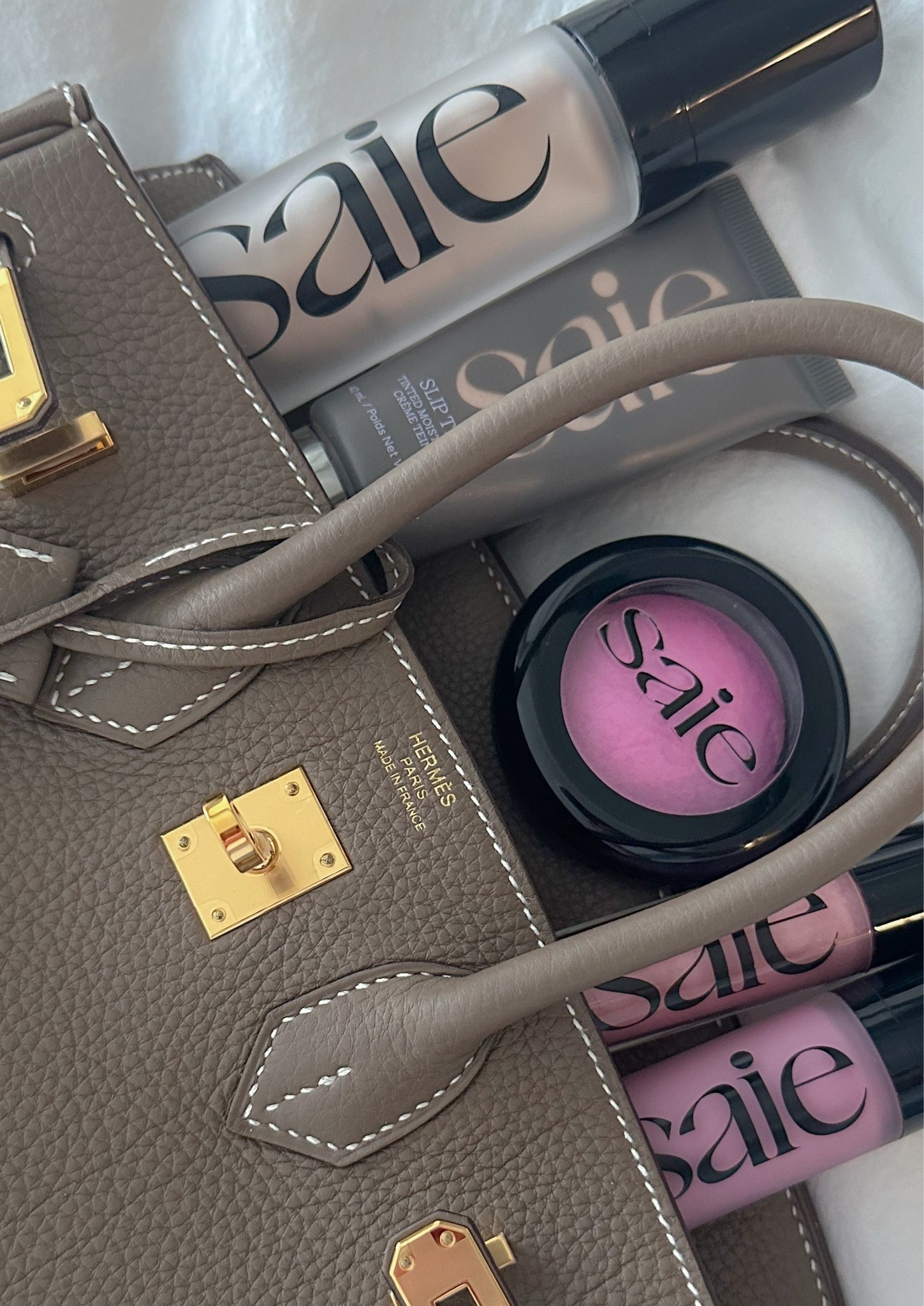 Beauty and a bag 🩷

My Saie beauty favorites meet my Hermès birkin 25 in étoupe 🤩

Saie blush is simply the best. I like both the liquid and powder ones.

#LTKselfcare #LTKBeauty #LTKootd