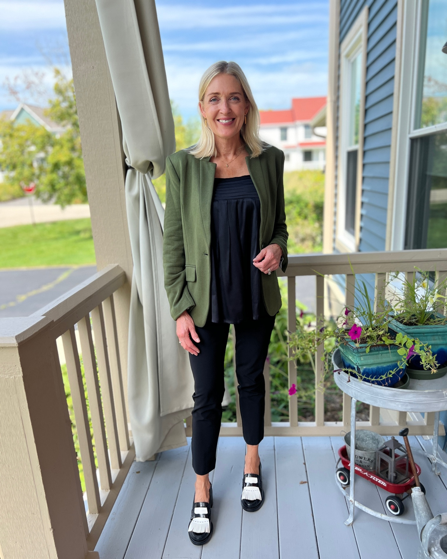 Fall transition outfit with an olive green blazer. Black babydoll cami, black trousers, white tassel loafers.

Use promo code DOUSED10 for 10% off at Gibsonlook.



#LTKunder100 #LTKshoecrush #LTKSeasonal
