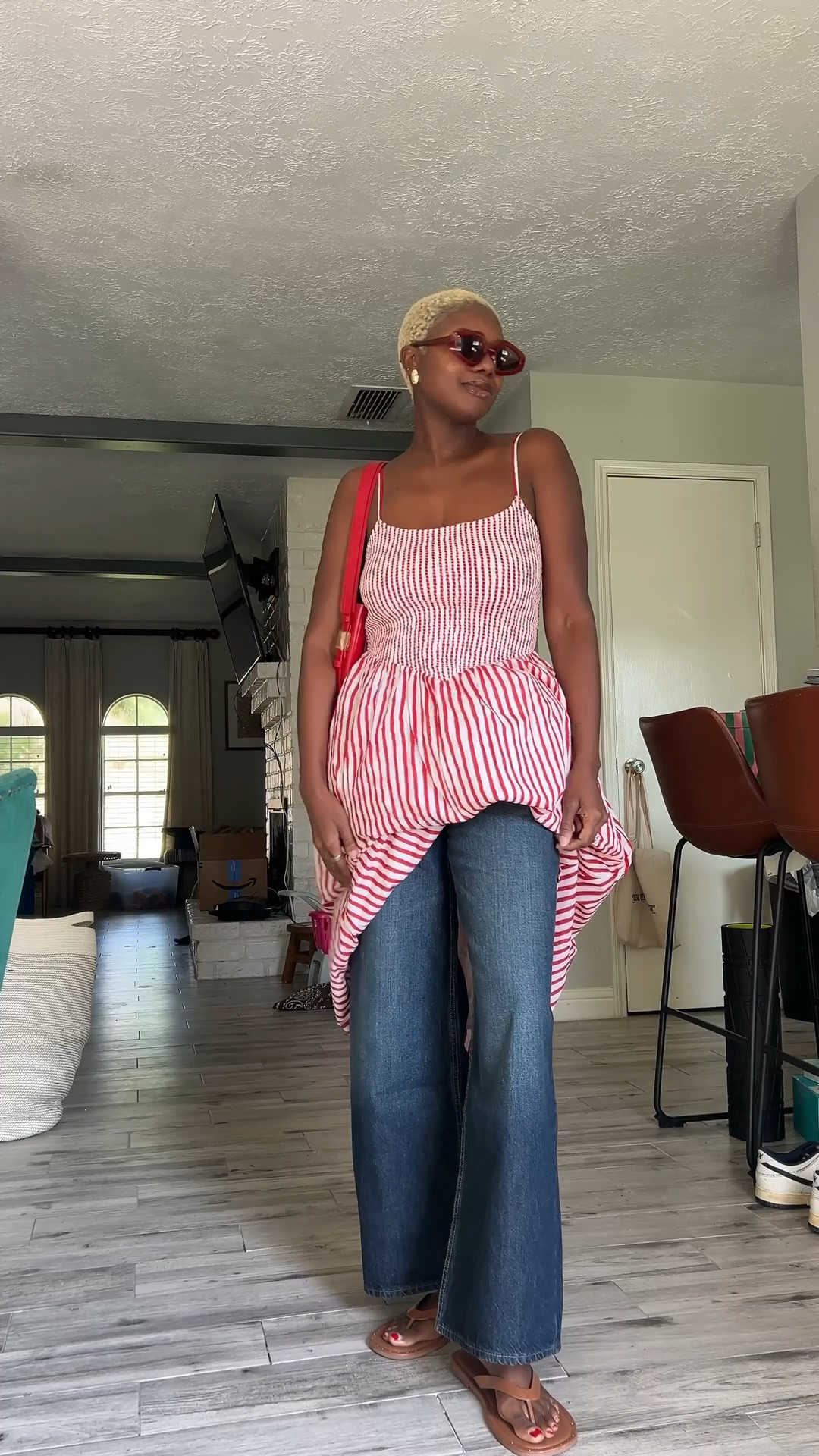 Summer dress & fall jeans! Red and white smocked dress with dark high rise wide leg jeans. Get a unique top effect by tucking the hem on the dress into your waist band.

#LTKdayinmylife #LTKootd #LTKmomlife