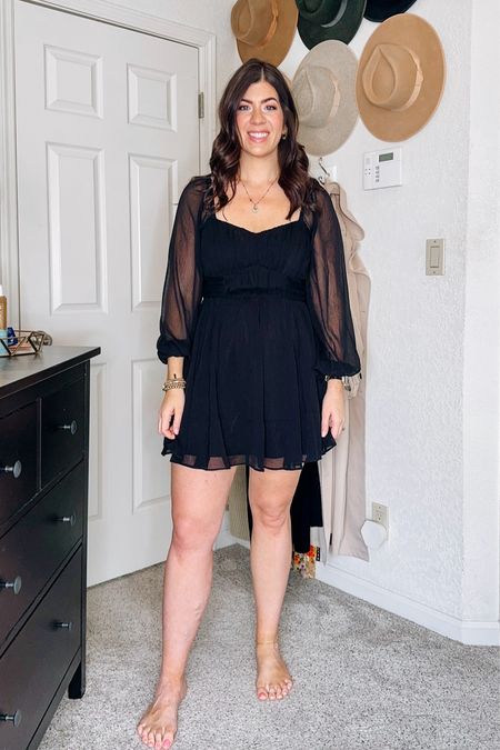 Wearing a medium in the sheer sleeve black mini dress 

#LTKmidsize #LTKwedding #LTKsalealert