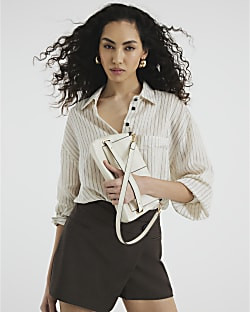 Cream Faux Leather Fold Over Clutch Bag | River Island UK & IE