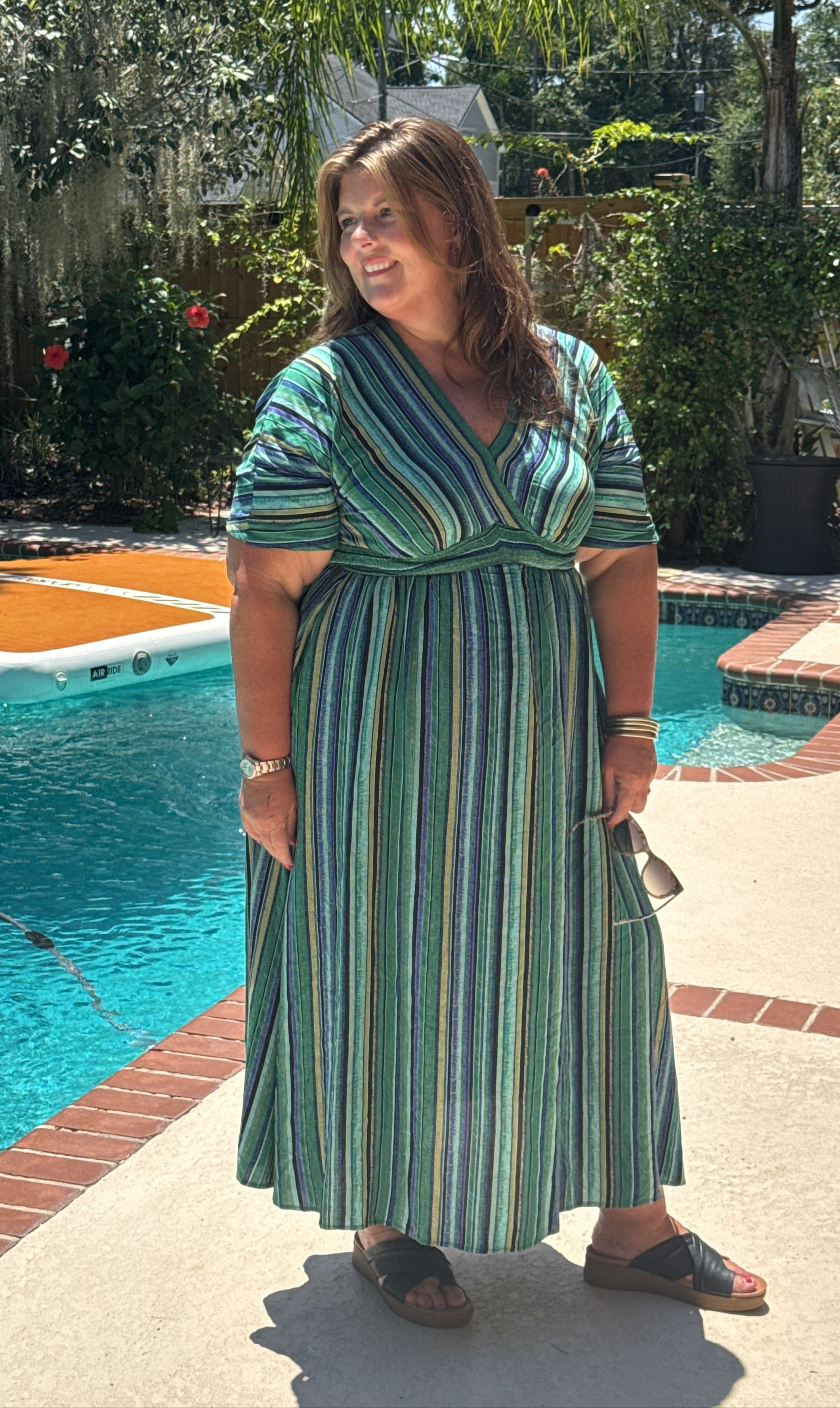 Green is my color but BloomChic offers this in 6 other colors too! Flowy, stretch, comfortable, and classy. Don't forget to use code CILLASUE at checkout. 

 