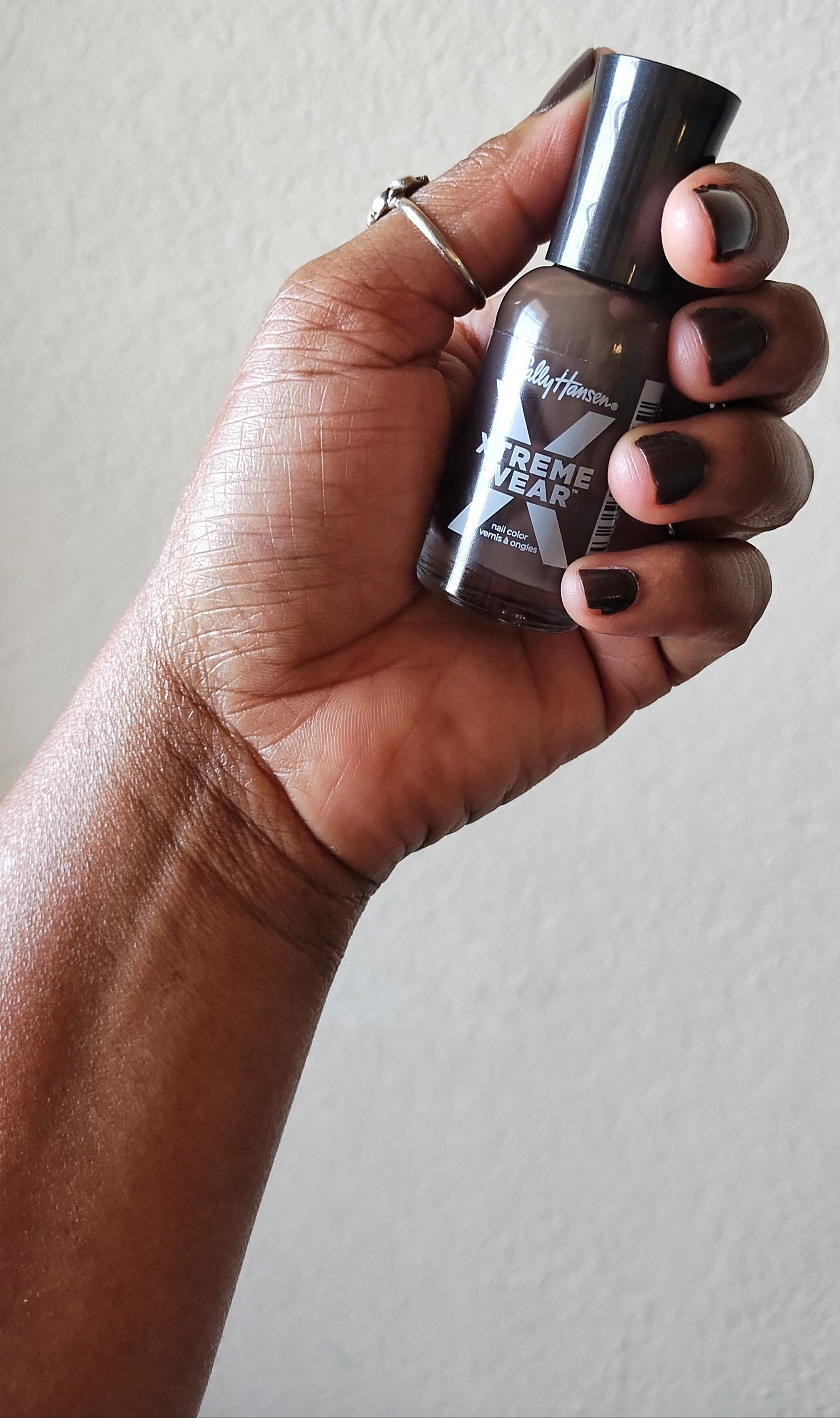 I've been on a hunt for a new neutral shade of polish besides black, here's Central Bark. This Sally Hansen nail polish shade is a mix of brown with black under tones and it's very pretty!🤎🖤

#LTKselfcare #LTKBeauty