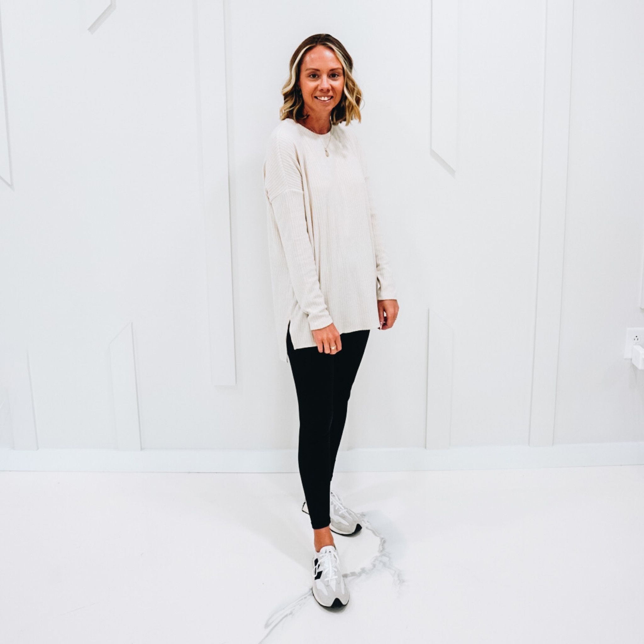 Ready for fall tunics, leggings and football. 

Fashionably late mom
Neutral sneakers 
Tunic
Walmart fashion
Black leggings 