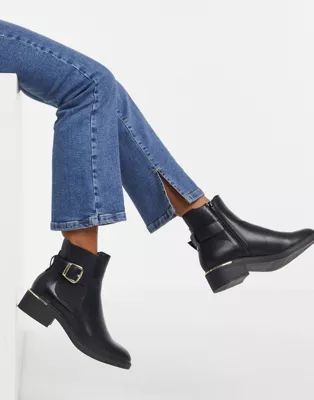 Schuh Caitlin ankle boot with buckle in black | ASOS (Global)