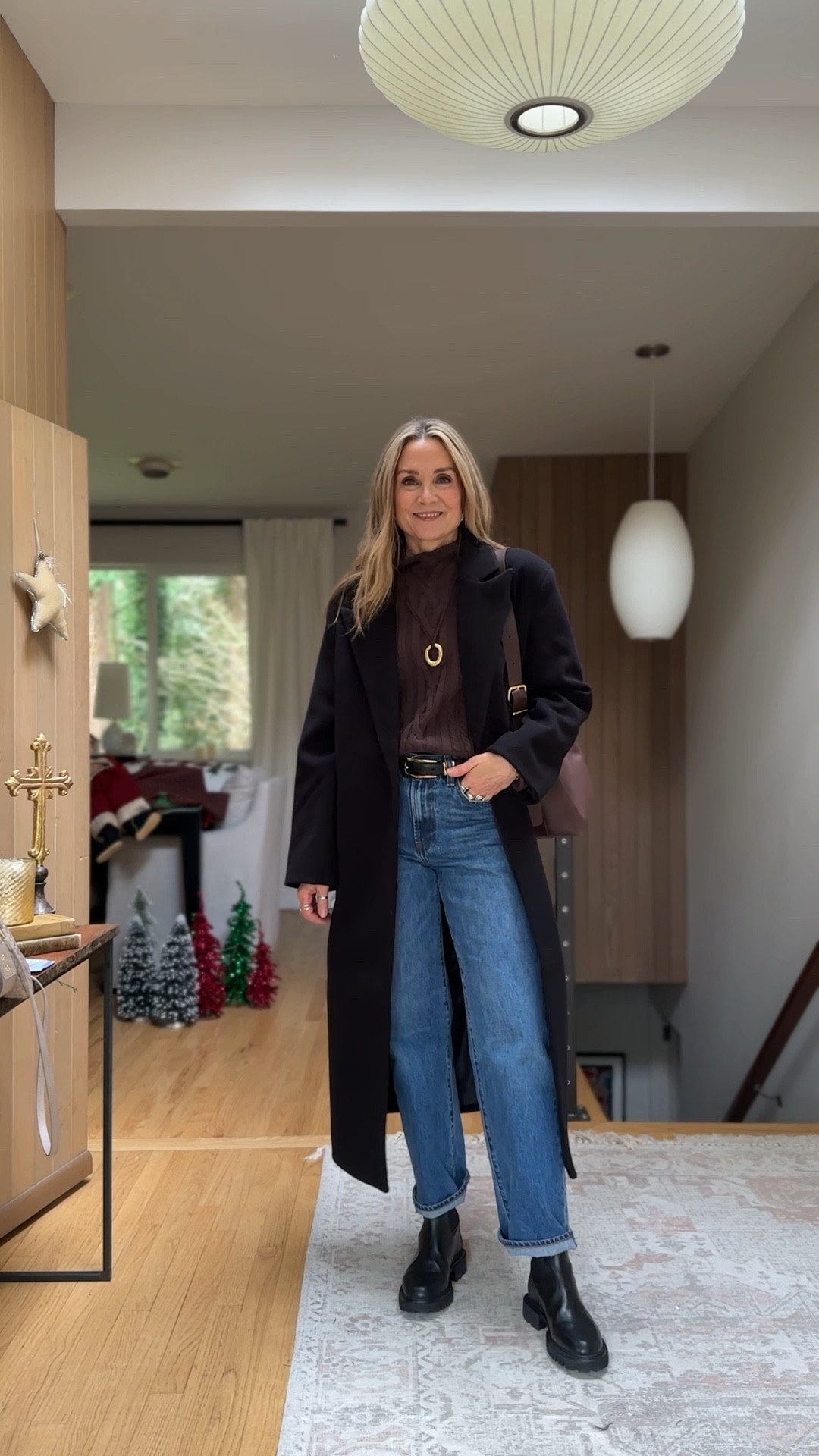 Outfit of the day! Velvet Heart brown sweater is on sale, wearing a small. Long black wool coat is a similar link. Loving these new Denim Forum jeans from Aritzia! Size 26. Heaven Mayhem cord necklace was a Christmas gift from Krista, I love it! Madewell belt and lug sole Chelsea boots finish off the look!

#LTKootd #LTKFindsUnder100 #LTKOver40