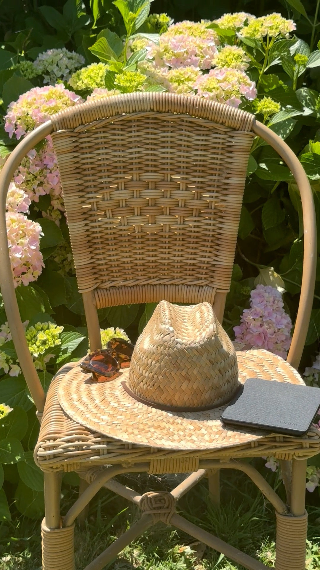 Summer essentials! Love this straw sun hat (gardening hat), my woven chair, my Kindle paperwhite and sunglasses in my hydrangea garden! I shared a few must have Moorhead hydrangeas, as well as the garden soil we use that is only $2 during the Memorial Sale happening now 💗

#LTKHome #LTKSaleAlert #LTKSeasonal