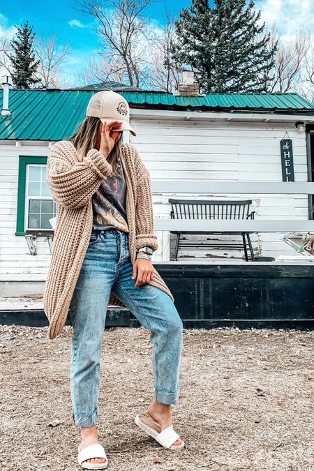 Spring outfit 
Slides
Trucker hat 
Jeans 
Outfit for spring
Cardigan 
Western tee 
Graphic tee 
Trucker hat outfit 
Cardigan outfit 
Layered outfit 
Casual outfit 
Layered casual outfit
How to wear a cardigan 

#LTKSeasonal #LTKstyletip