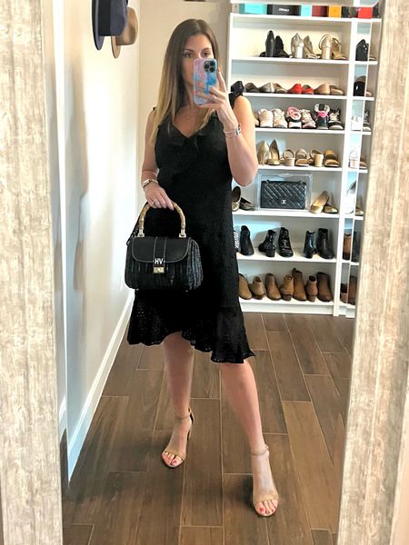 Serving Saturday night vibes. 💁🏼‍♀️ This LBD will be on high rotation this summer. Love the faux wrap detail, the eyelet trim and the asymmetrical hem. 

Runs TTS. Wearing a size 6.