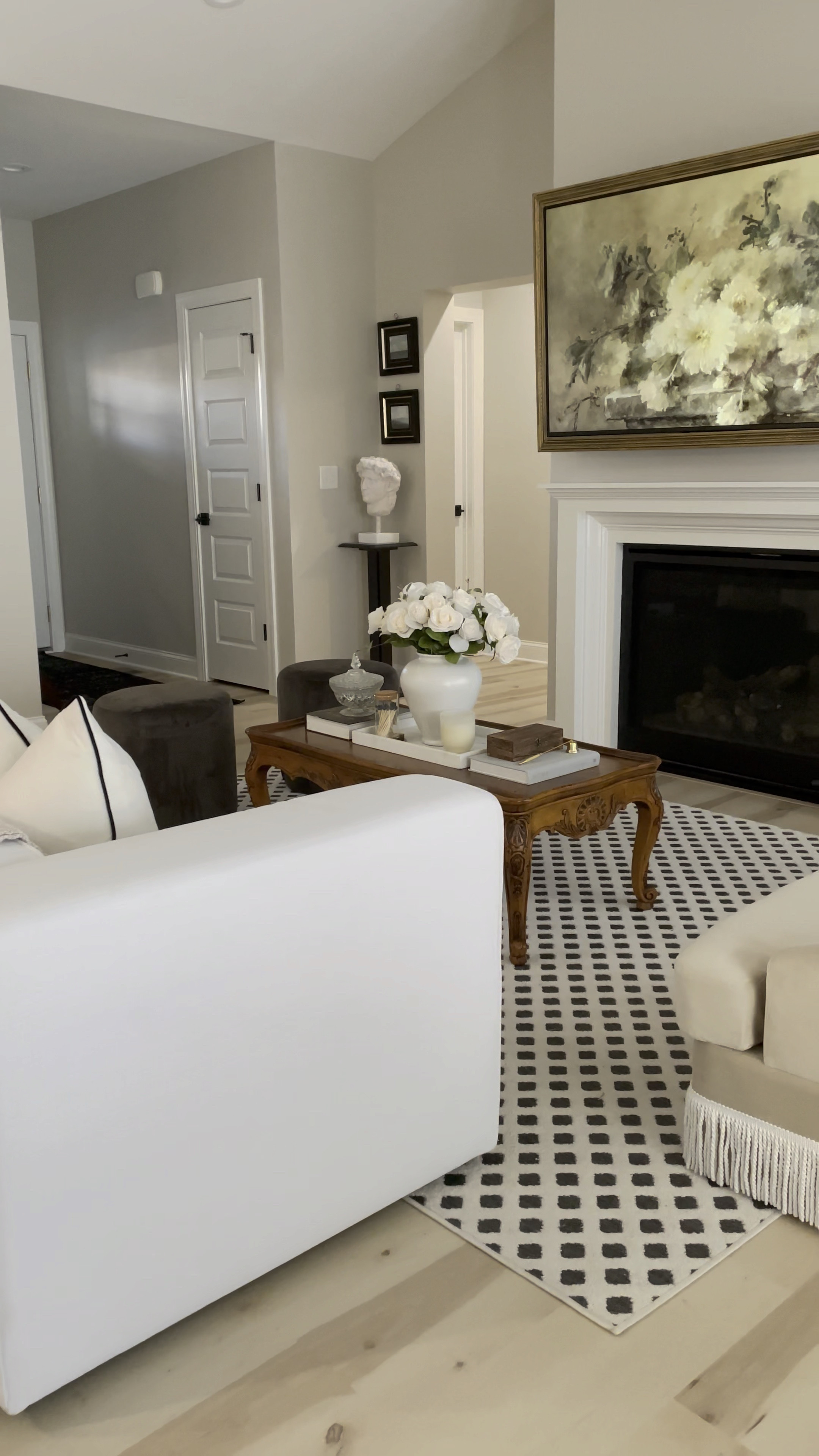 Modern living room. Vintage living room. Home decor. Classic interior design. Bullion fringe accent chair. White modern couch. White sofa. Vintage coffee table. Neutral home decor. 

#LTKfindsunder100 #LTKhome #LTKfindsunder50