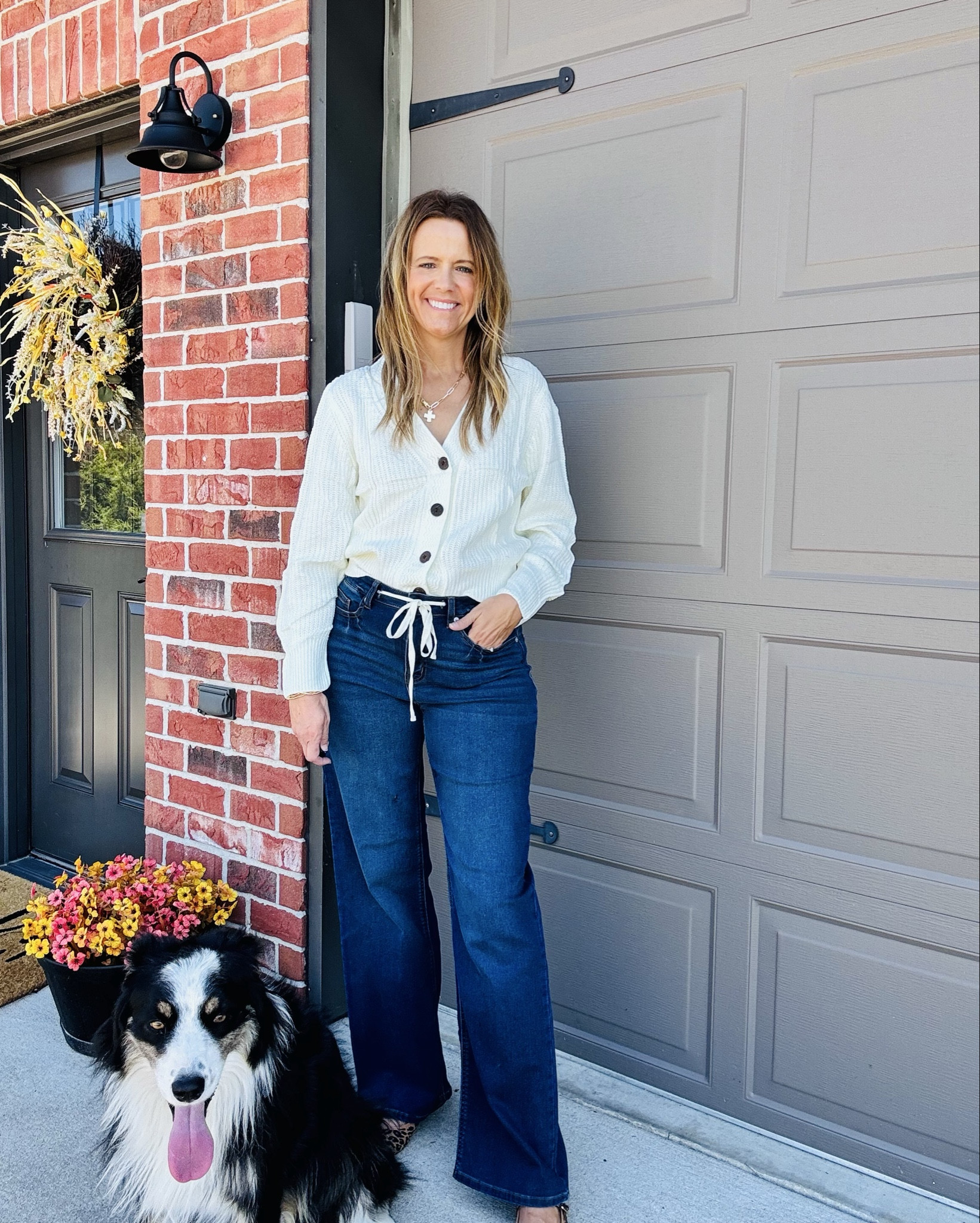 Loving this laid-back look today — cozy button up sweater, wide-leg jeans, and a whole lot of fall vibes 🍁💕 Bonus: Mya insisted on joining the photo shoot 🐶💁‍♀️ Guess she wanted to show off her good side, too!

#FallStyle #OOTD #DogMomLife #CasualVibes #ComfyCute #ShopLTK #FallFashion #MidwestMamaStyle #CozySeason

#LTKFindsUnder50 #LTKShoeCrush #LTKStyleTip