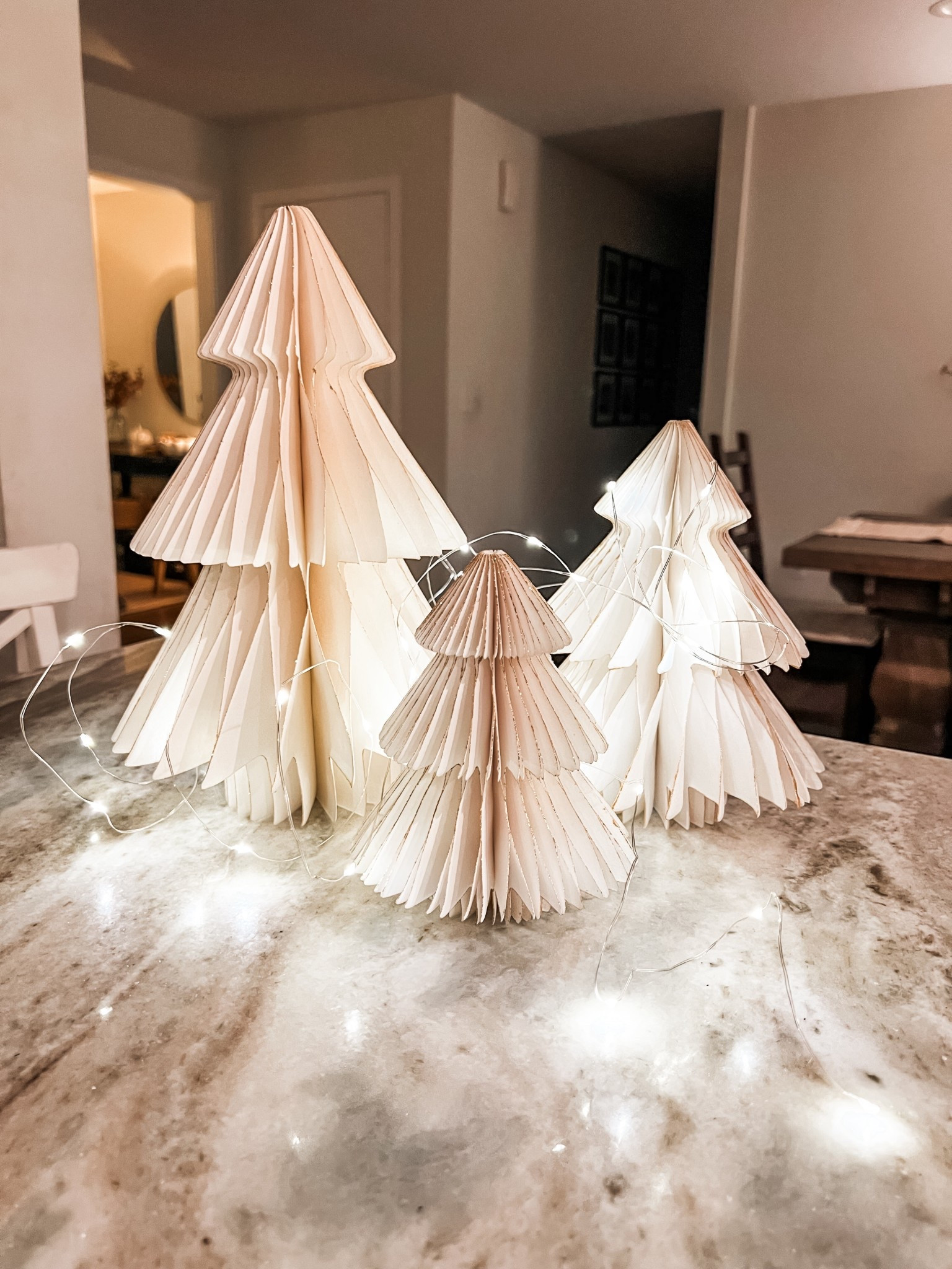 Walmart accordion fold paper trees, these are so impressive in person! They snap together with magnets! Easy to assemble and reuse, store away flat. #walmarthome 

#LTKHome #LTKFindsUnder50 #LTKHoliday
