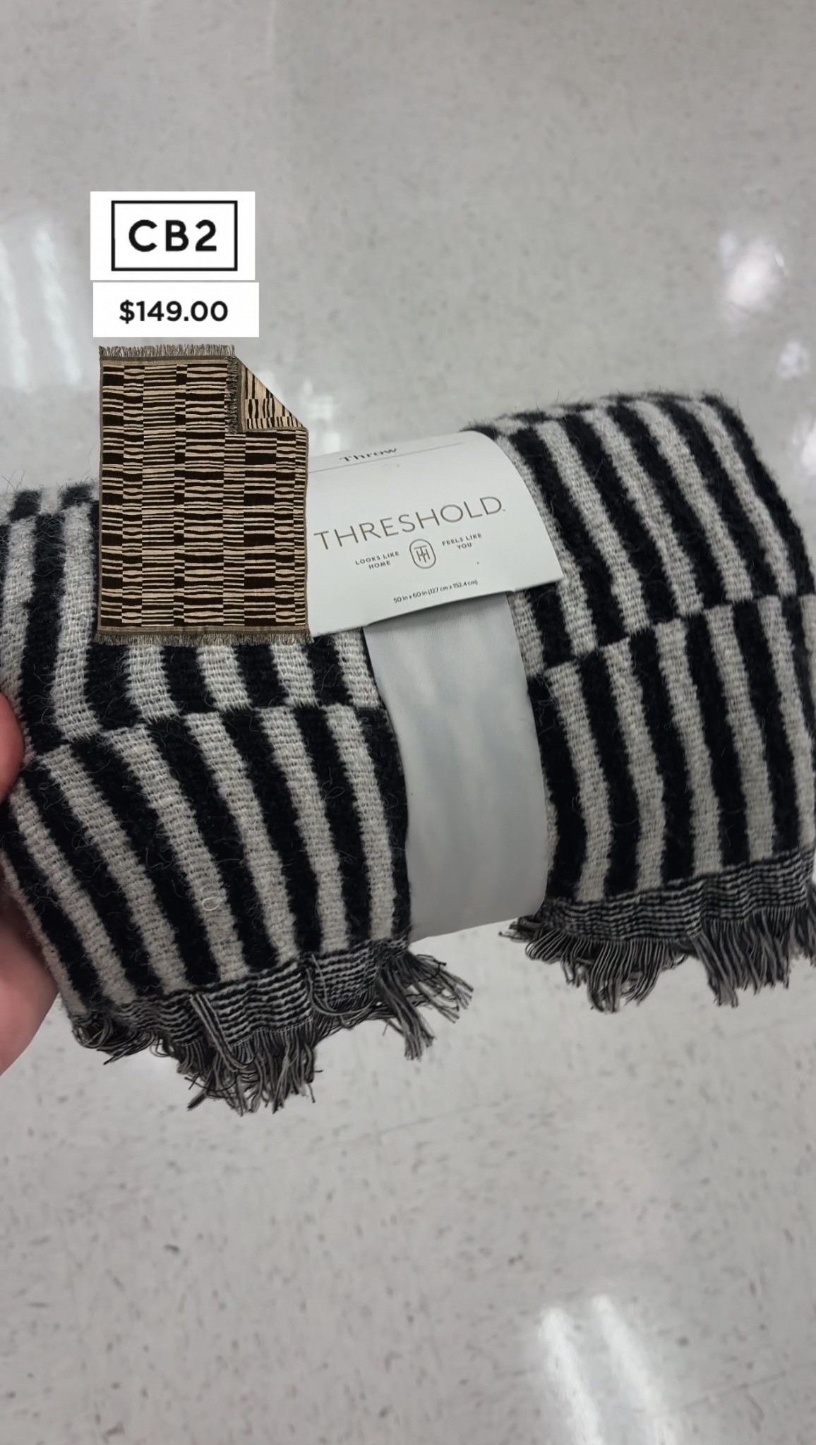 This throw stopped me in my tracks at Target today because… CB2 dupe alert. 

The CB2 version is $149, and this Threshold one is $30. Same bold black + cream stripe. Same cozy texture. Same “designer tossed effortlessly over the arm of your sofa” vibe… just not the designer price tag.

Perfect for elevating a neutral living room, layering at the foot of your bed, or adding some modern minimalist texture to your fall/winter decor.

If you’ve been wanting the CB2 look without the CB2 budget — this is it.

Linked both here.

#LTKFindsUnder50 #LTKHome #LTKSaleAlert