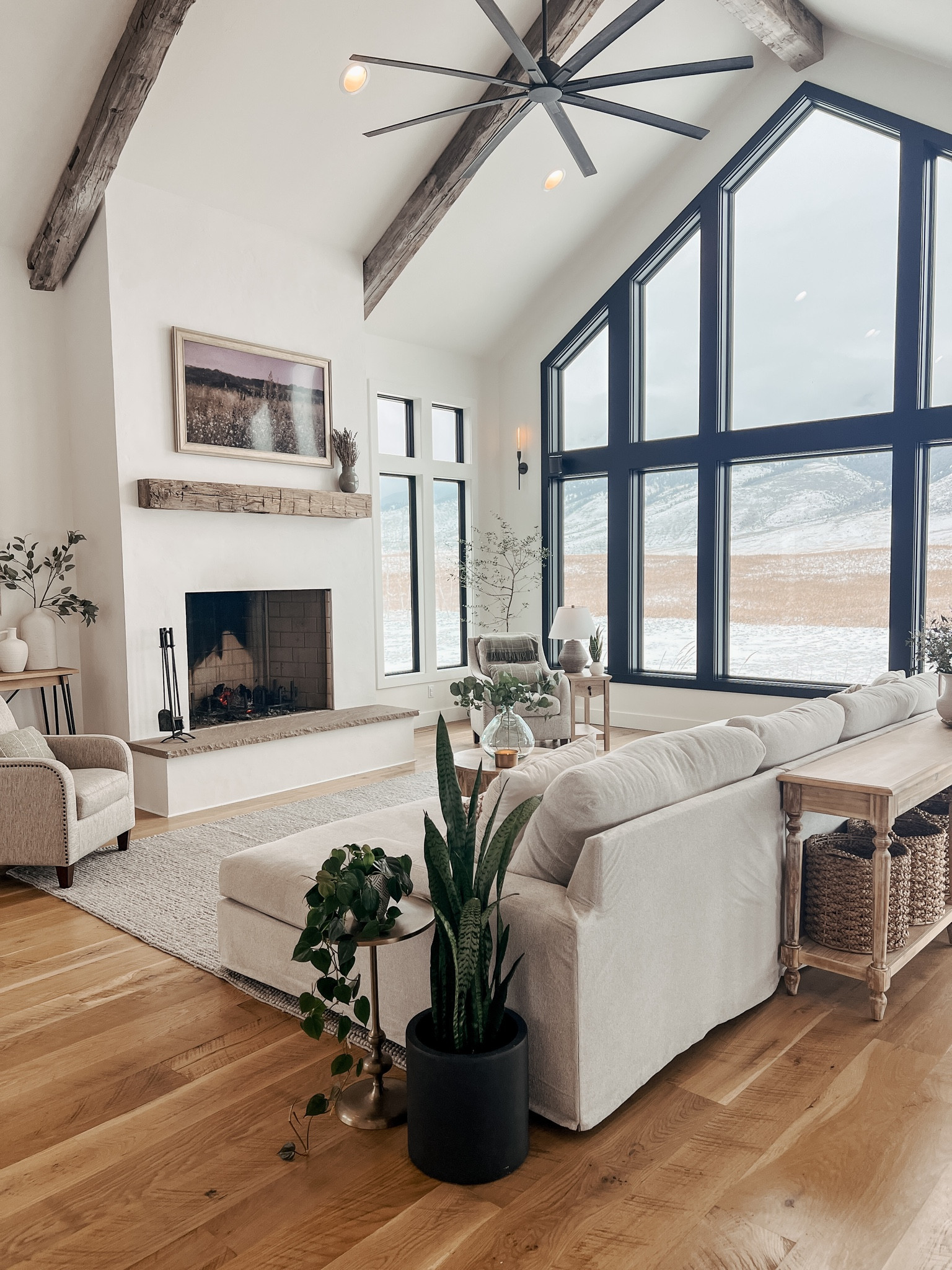 Living room decor and accessories 

Console table 
European inspired console table 
Console table with baskets
Double chaise couch 
Plants 
Accent chairs 
White and wood
Black windows
Window wall
Plaster fireplace
European fireplace
Rustic wood beam
Rustic wood mantle
 FrameTV
Fireplace 

#LTKHome