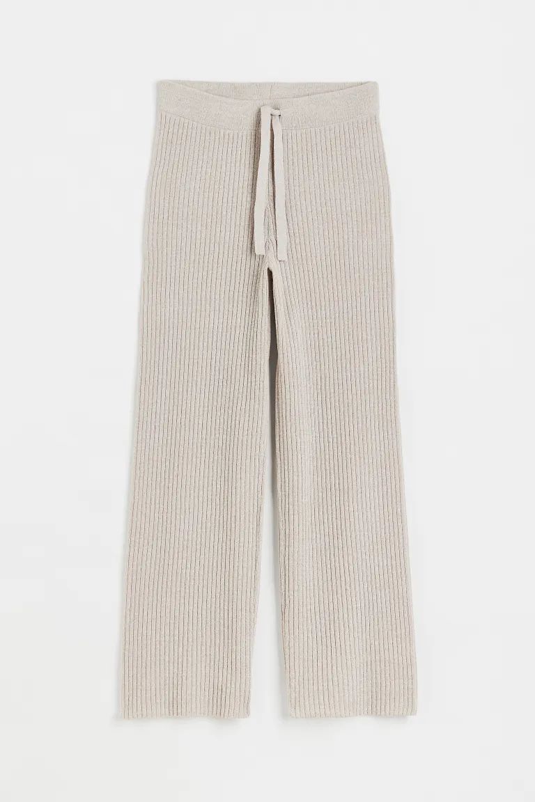 Conscious choice  New ArrivalRibbed pants in a fine-knit cotton blend. Rib-knit waistband with a ... | H&M (US + CA)