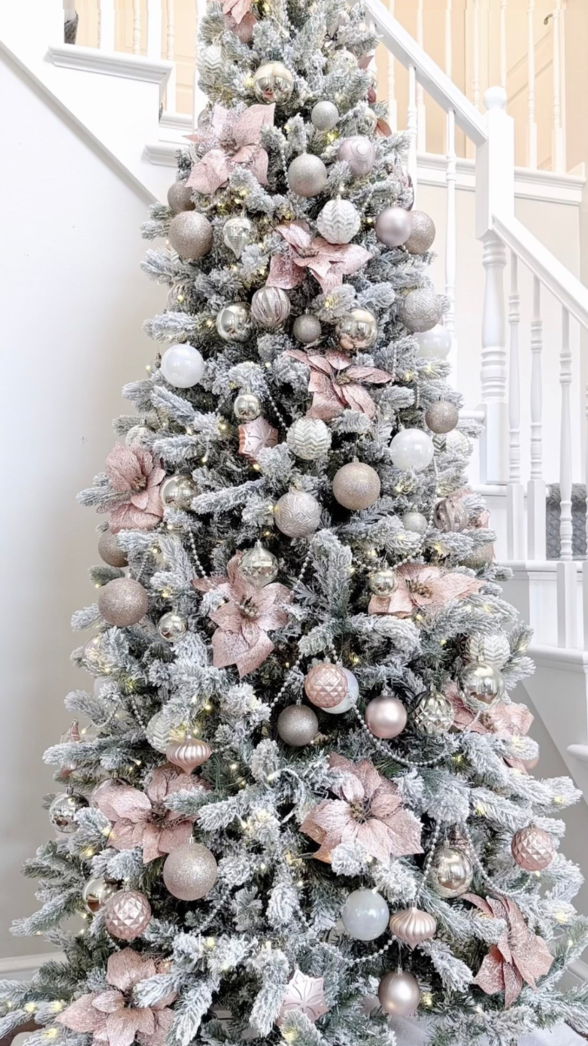 Pretty in pink 🎀 my pinkmas themed whimsical flocked Christmas tree with pink poinsettia flowers, silver beaded garland, and lots & lots of soft pastel pink & metallic ornaments. The best part is everything on this tree is non breakable which makes it perfect for households with little ones or pets. 

#LTKHoliday #LTKCyberWeek #LTKHome