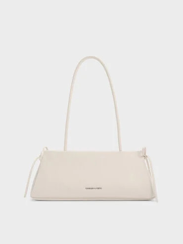 Hazel Bow Elongated Trapeze Shoulder Bag
    
         - Meringue White | Charles & Keith UK