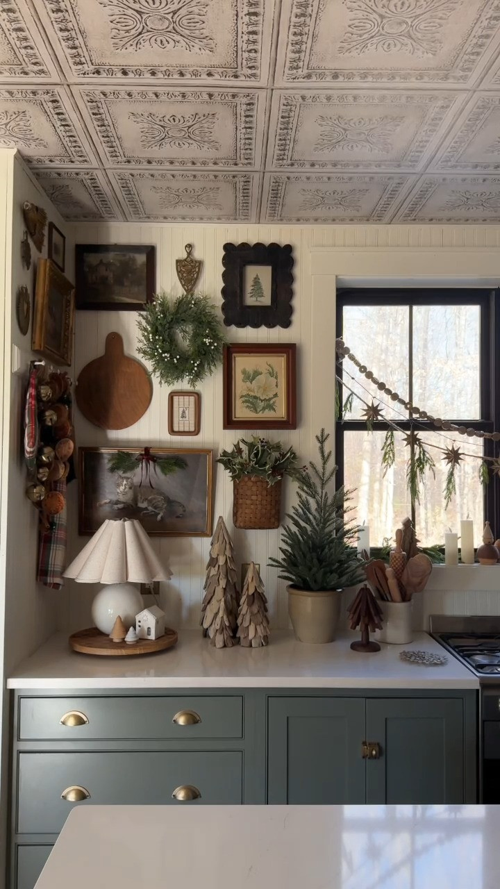 The heart of the home ❤️ Comment 'christmas kitchen' for links! Went for a more vintage-inspired look and added a couple of pops of red! I wanted it to feel 'Christmas tree farm' inspired so I added a ton of trees and swapped out some tree art for on our gallery wall! What do you think!? Kitchen island decor is coming up tomorrow! #christmas2024 #christmaskitchen #christmasdecor 

 

#LTKHoliday #LTKSeasonal #LTKVideo