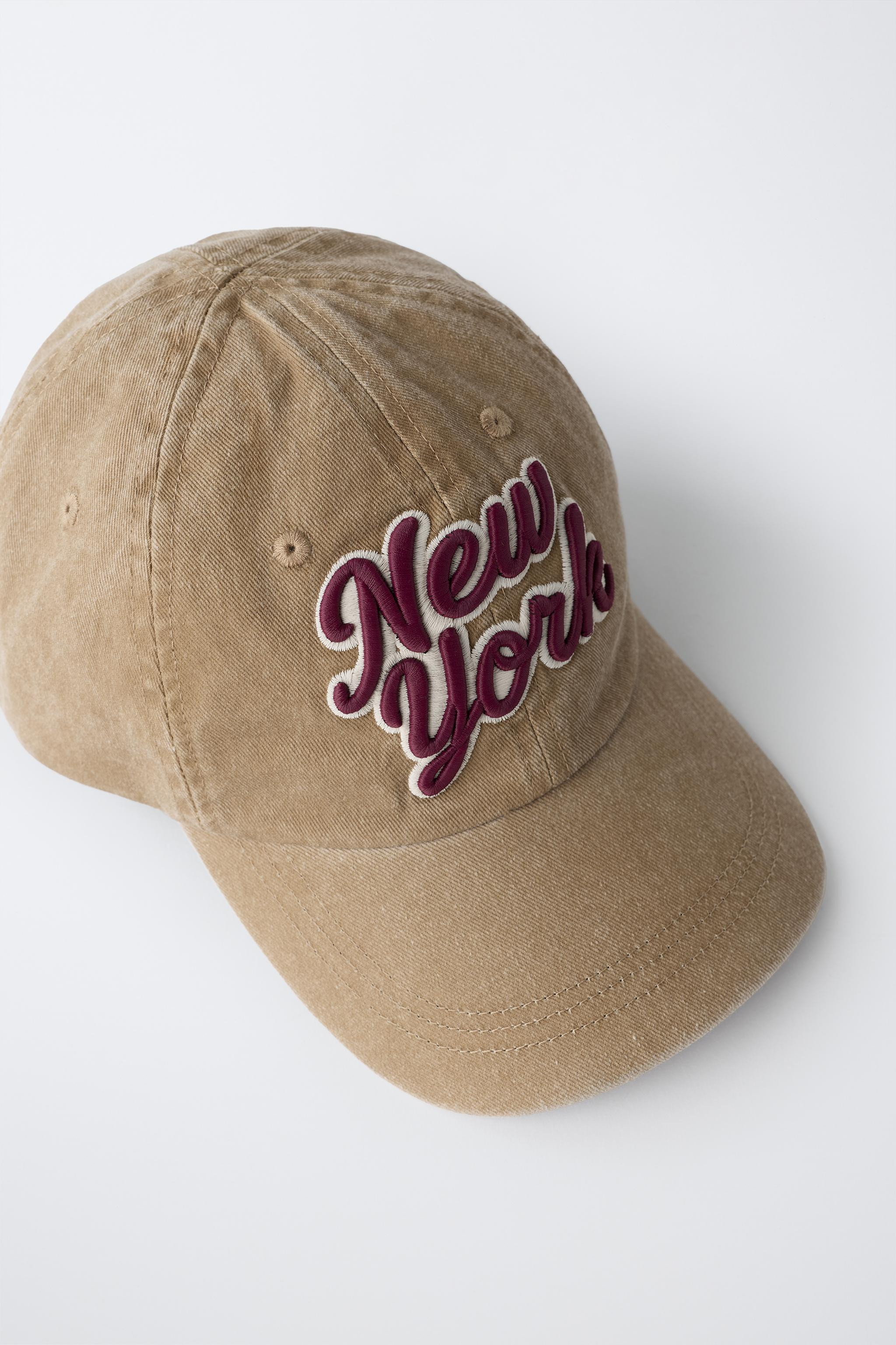 Cap with a touch-fastening strap at the back and a 'New York' text patch on the front. | Zara UK