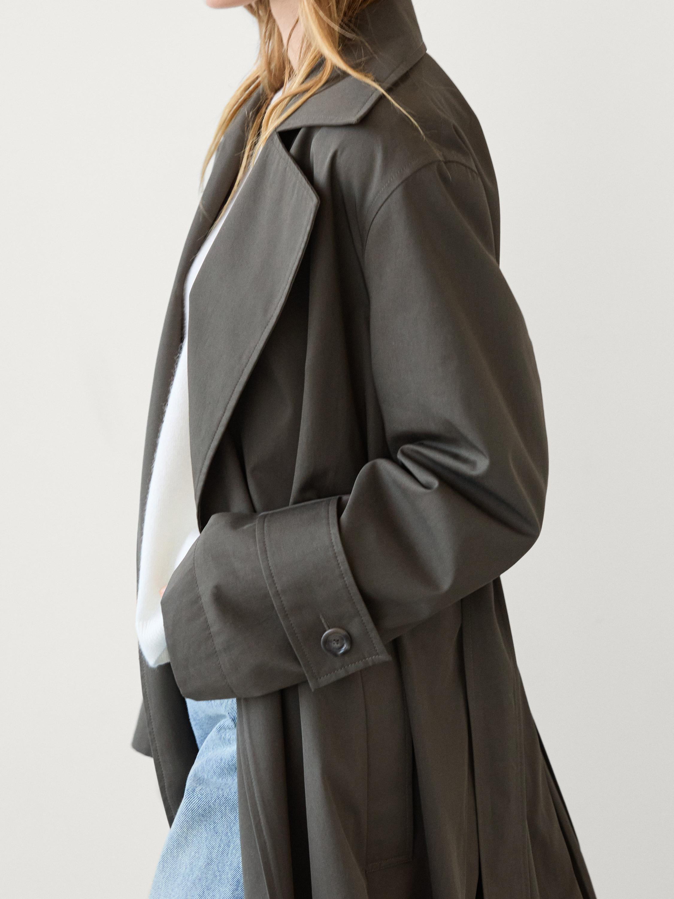 Long cotton trench coat  $329.00 Notched lapel collar. Waistband with belt loops. Cuffs with butt... | Massimo Dutti US
