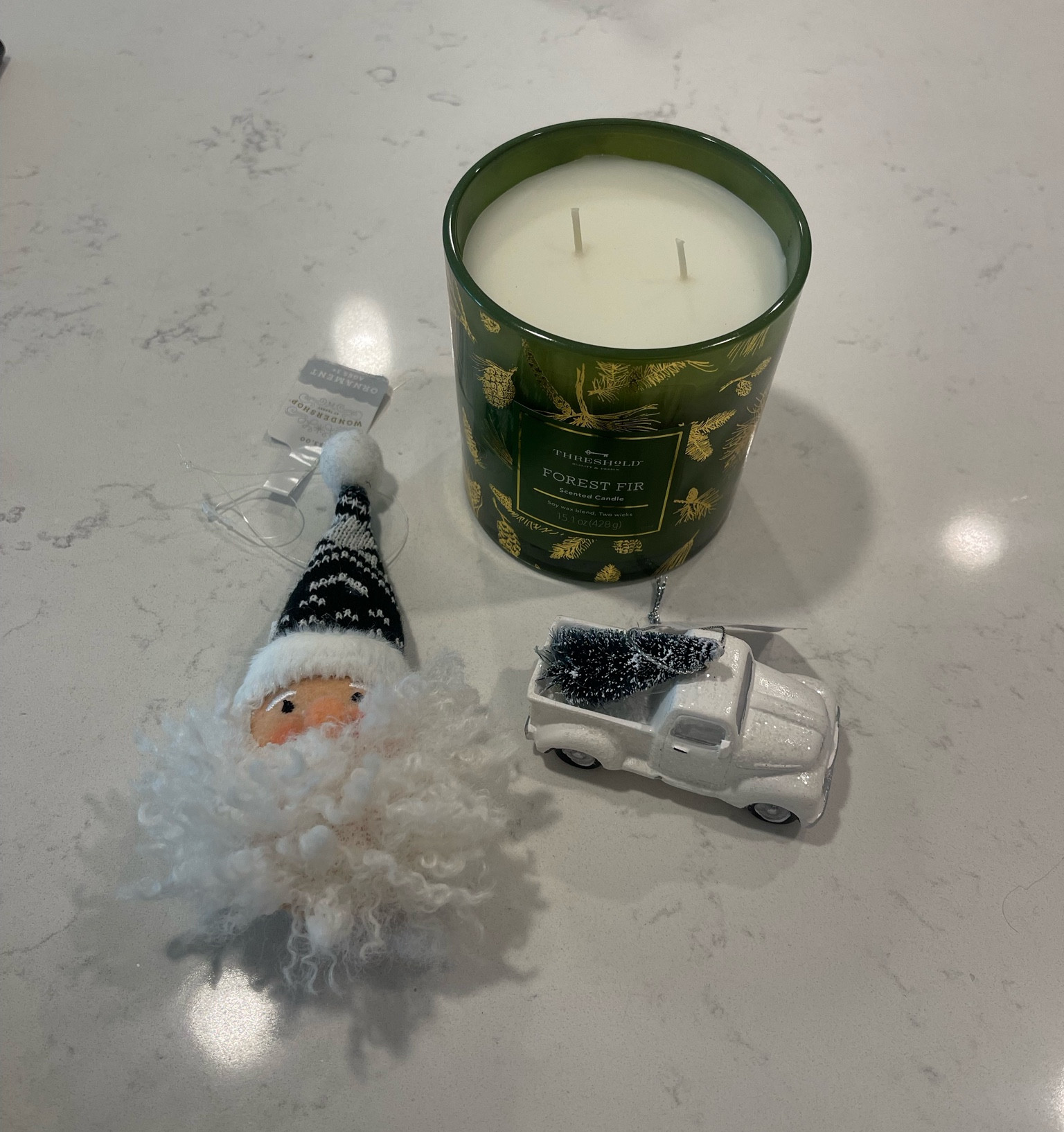 Picked up some Christmas ornaments from targets wonder shop for only 3 dollars and a nice smelling Christmas candle ! 

#LTKHoliday #LTKSeasonal #LTKhome