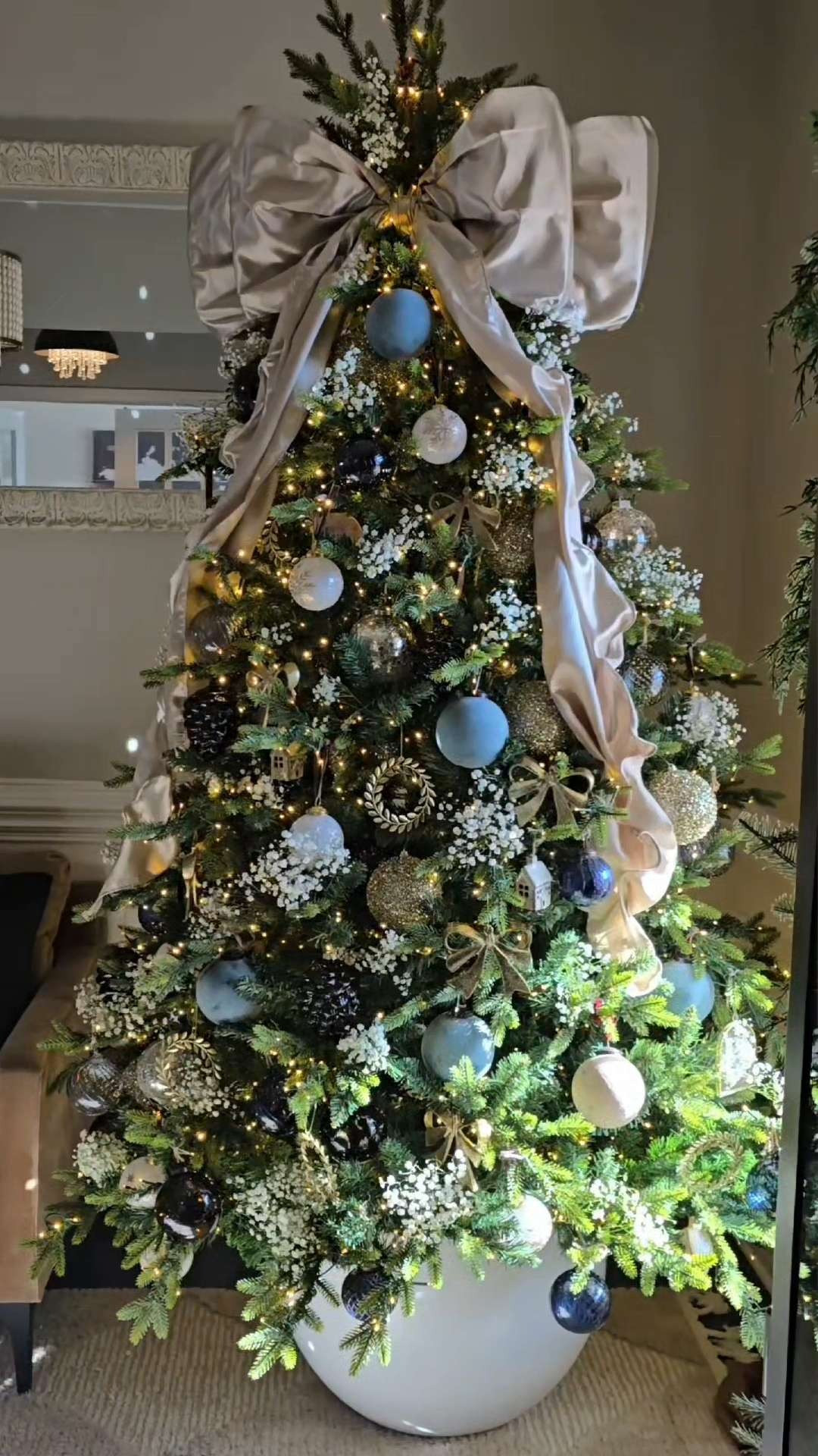 Neutral Christmas Tree. Blues, bows, and baby's breathe. Many of the ornaments I used are no longer in stock so I linked some similar finds.  

 #LTKHoliday #LTKSeasonal #LTKHome