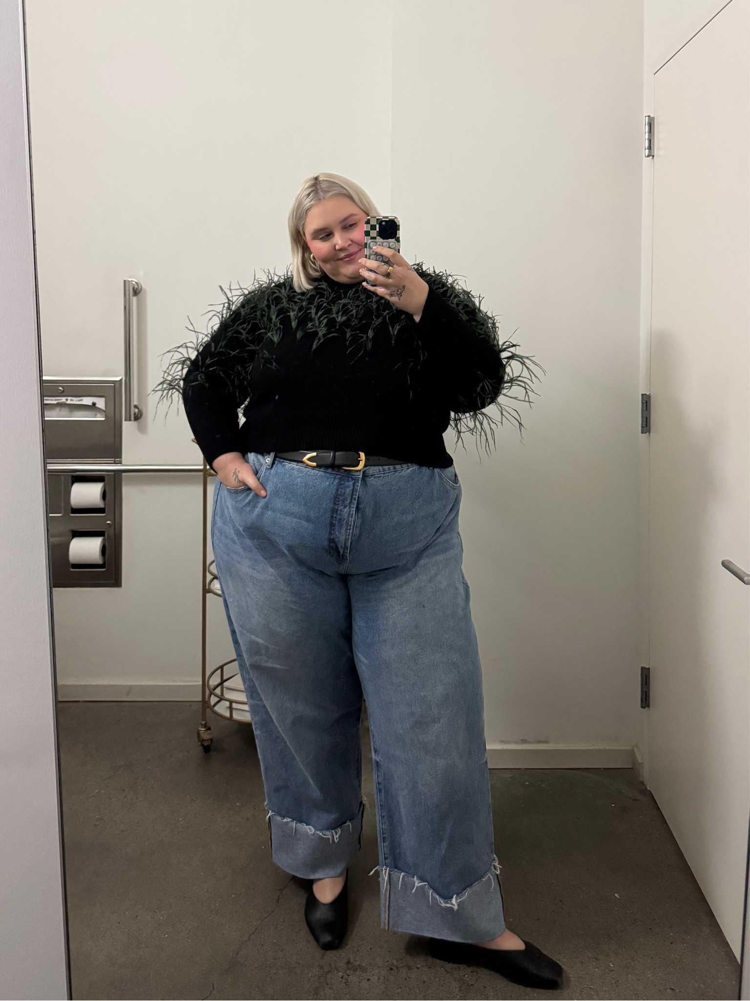 I think this outfit is quickly going to become a go-to repeater in my winter wardrobe. The Eloquii jeans look good with literally anything and this Tanya Taylor sweater is such an insanely good conversation starter. She’s giving corporate fashion office chic!!!

Wearing:
Size 28 in Eloquii Cuff Jeans 
Size 3X in Tanya Taylor Sweater
Size 12 in Sam Edelman Flats