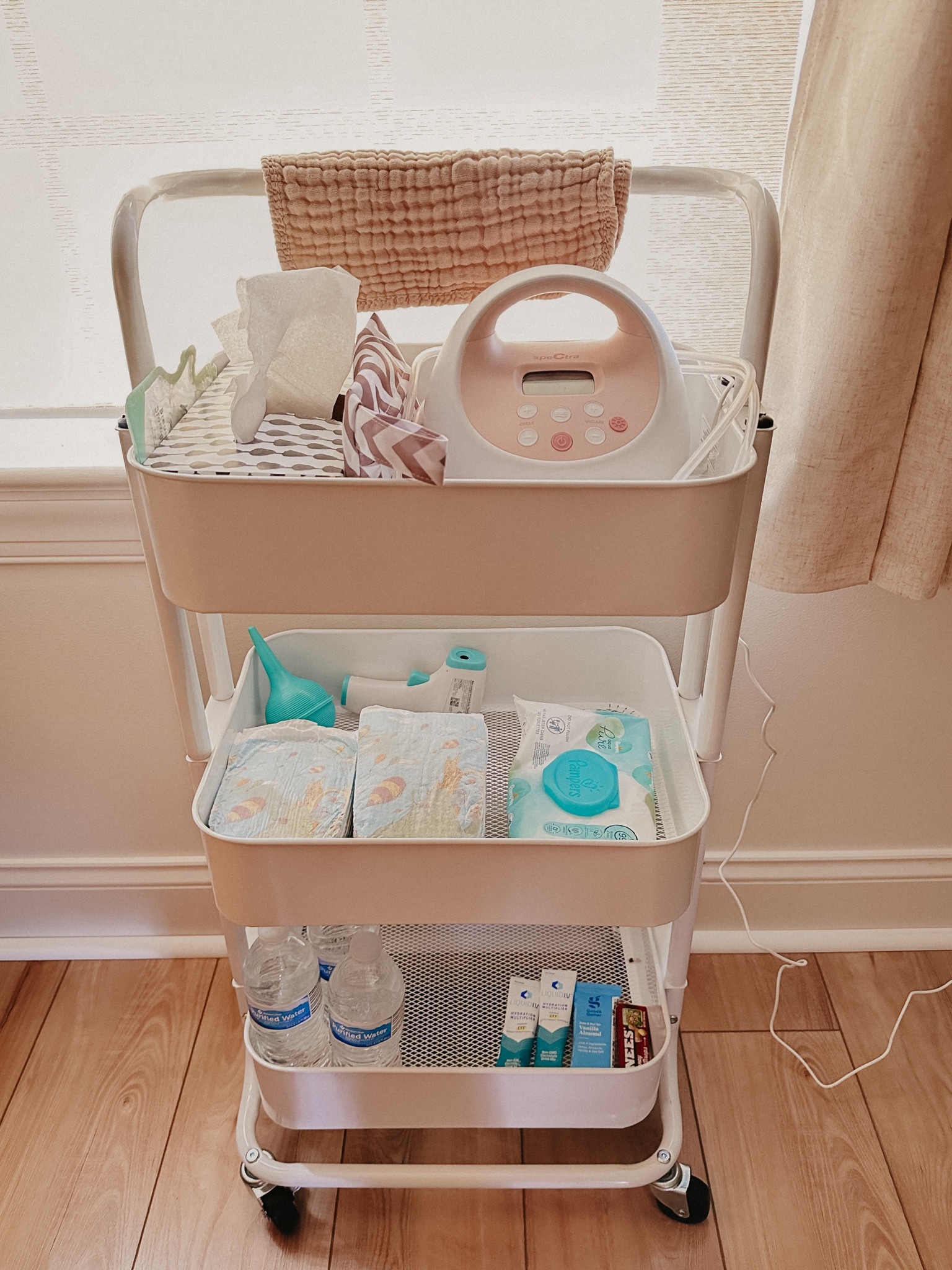 Nursery utility cart with all of the baby, pump, drink, food necessities.. slowly adding more items to it - ordered this a day after being home from the hospital and it’s been a godsend 👌🏼 

#LTKsalealert #LTKbaby #LTKbump