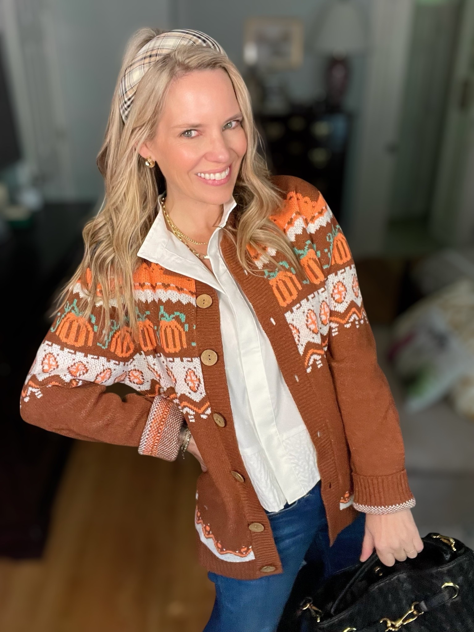 🍂✨ Fall fashion favorite! This cozy pumpkin print cardigan is the ultimate festive layer for autumn 🍁🎃. I styled it with a crisp white button-down top and my go-to high-waisted jeans, making it the perfect casual-chic outfit for pumpkin patches, school events, or weekend outings. The plaid padded headband adds a preppy touch, while my classic gold jewelry stack (necklace + hoops + bracelet) elevates the look with timeless shine ✨.

Paired with a structured satchel bag and leopard slingback flats, this outfit blends cozy comfort with a polished finish—ideal for everyday wear this season. 🍂

🛍 Shop the full look:
	•	Fall pumpkin cardigan (Amazon)
	•	White button-down top (Amazon)
	•	Mother Denim jeans
	•	Plaid padded headband (Amazon set)
	•	Hazel satchel bag (Walmart)
	•	Leopard slingback flats (Target)
	•	Abbott Lyon watch
	•	Melinda Maria necklace, hoops, and bracelet stack (use code PREPPYREBEL for 10% off ✨)

🎃🍁 Cozy, chic, and festive—this fall outfit has it all!

⸻

 fall cardigan outfit, pumpkin print sweater, cozy fall fashion, affordable Amazon fall finds, plaid headband, leopard flats outfit, casual chic fall style, pumpkin patch outfit, fall jewelry stack


#LTKFindsUnder50 #LTKFindsUnder100 #LTKOver40