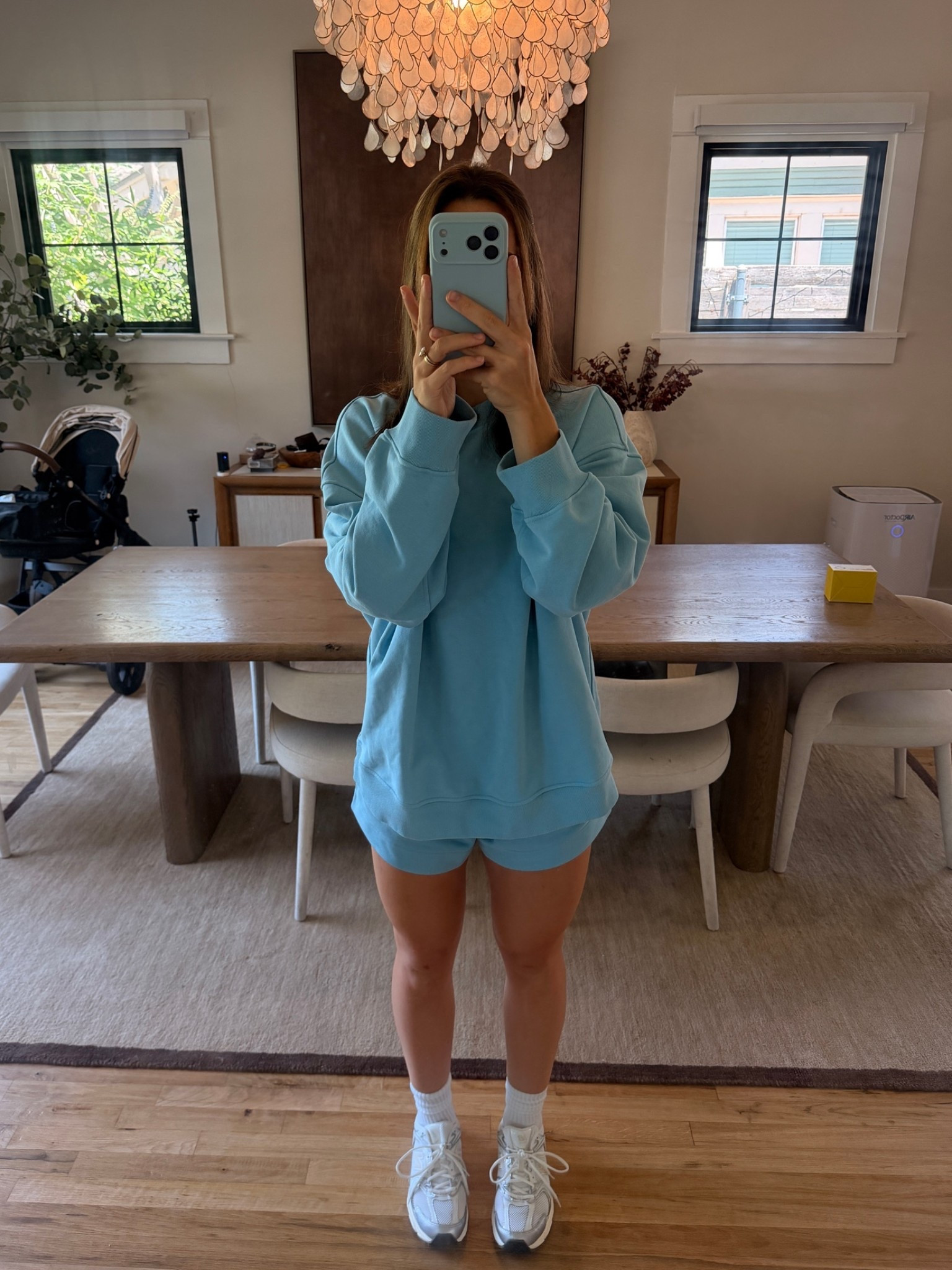wearing a m in both