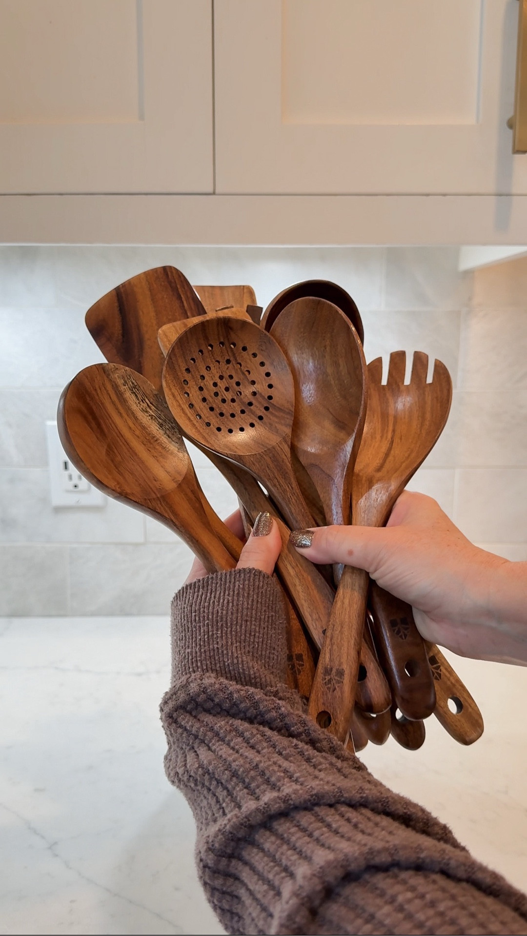 I ditched my old cooking utensils for a healthier, non-toxic option. This 10 piece teak wood utensil set is not only beautiful but functional in your kitchen. They look great in this marble crock on my kitchen countertop. 

#LTKfoodie #LTKselfcare #LTKHome